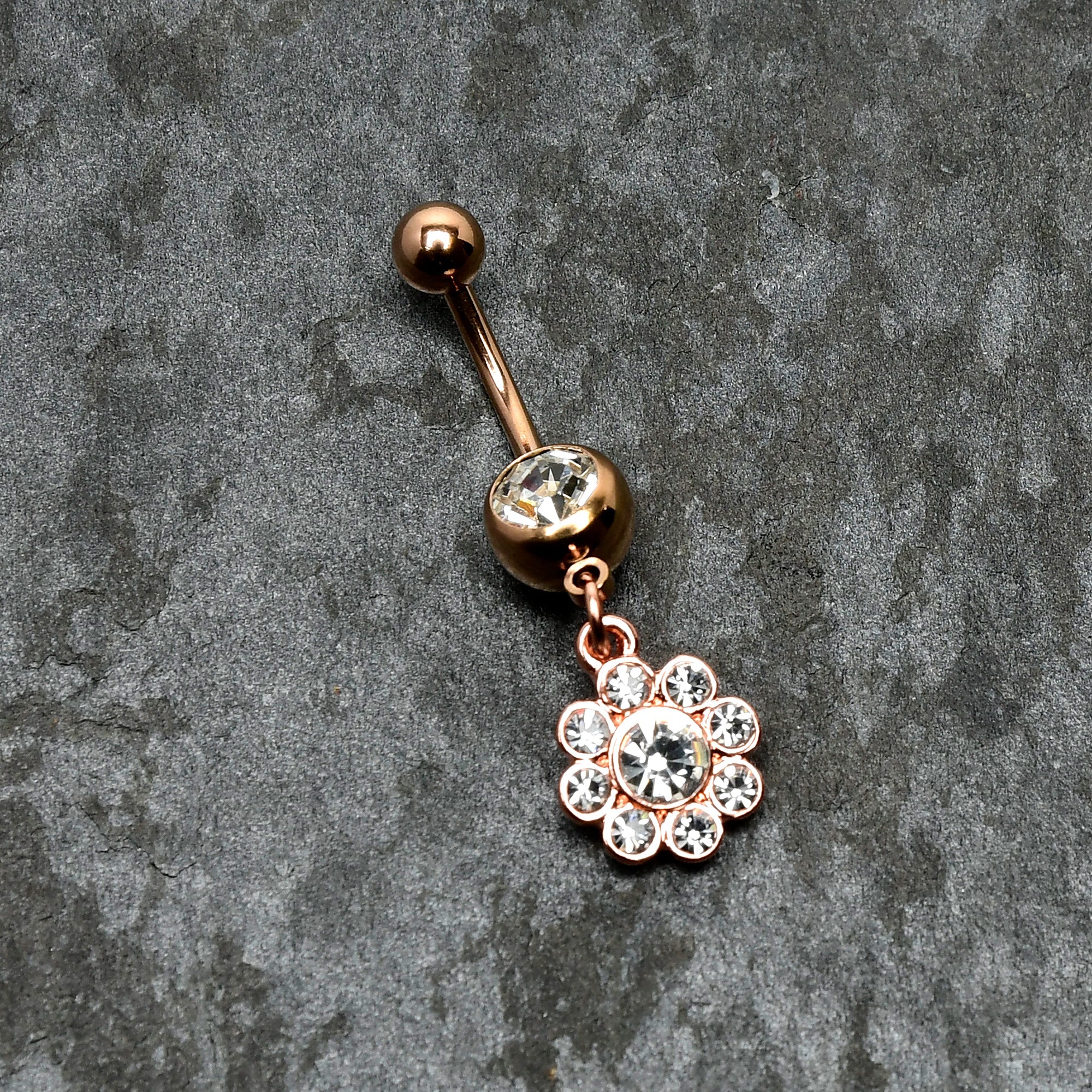 BodyCandy Clear Gem Rose Gold Tone Whimsy Flower Dangle Belly Ring — in-use photo