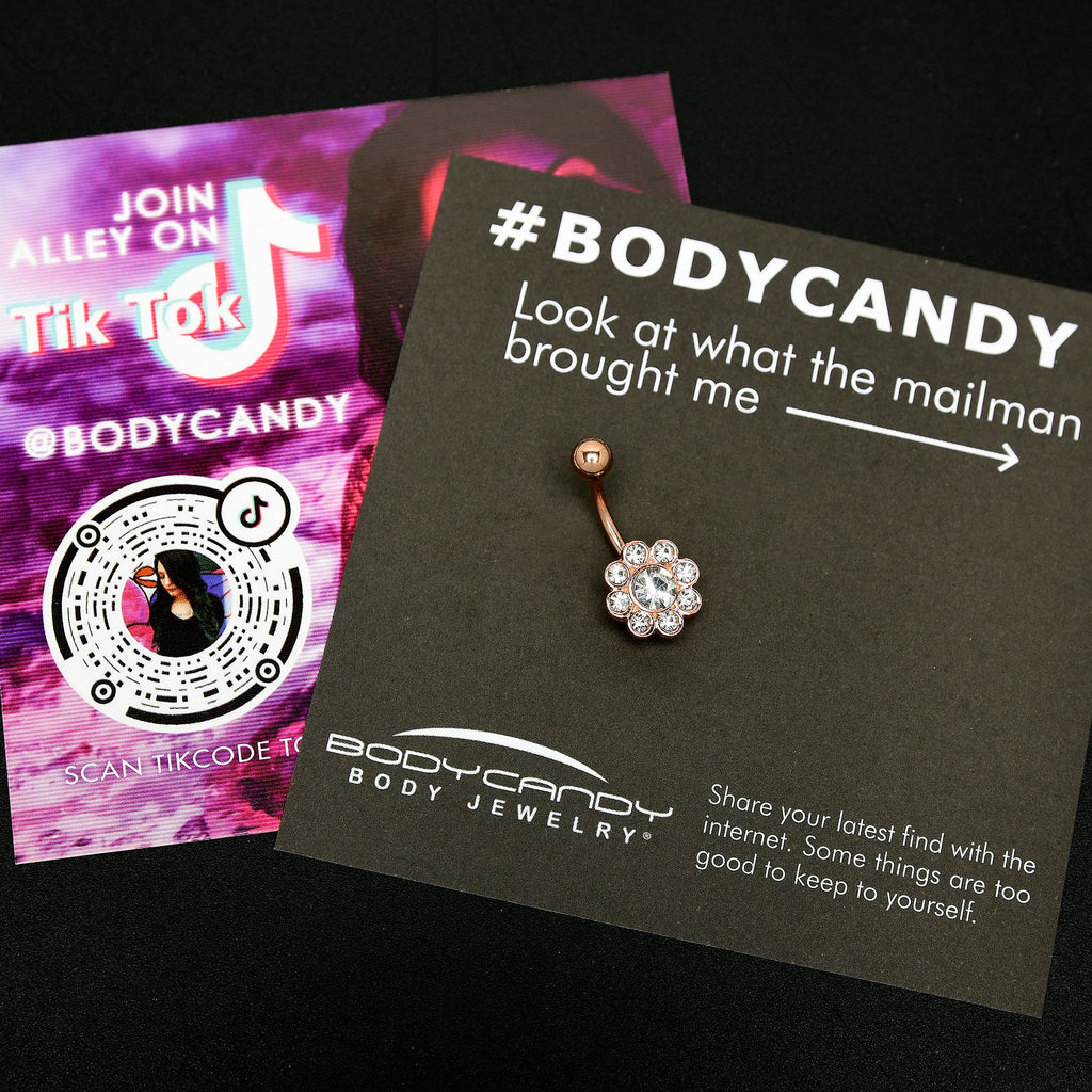 BodyCandy Clear Gem Rose Gold Tone Whimsy Flower Belly Ring — detail close-up