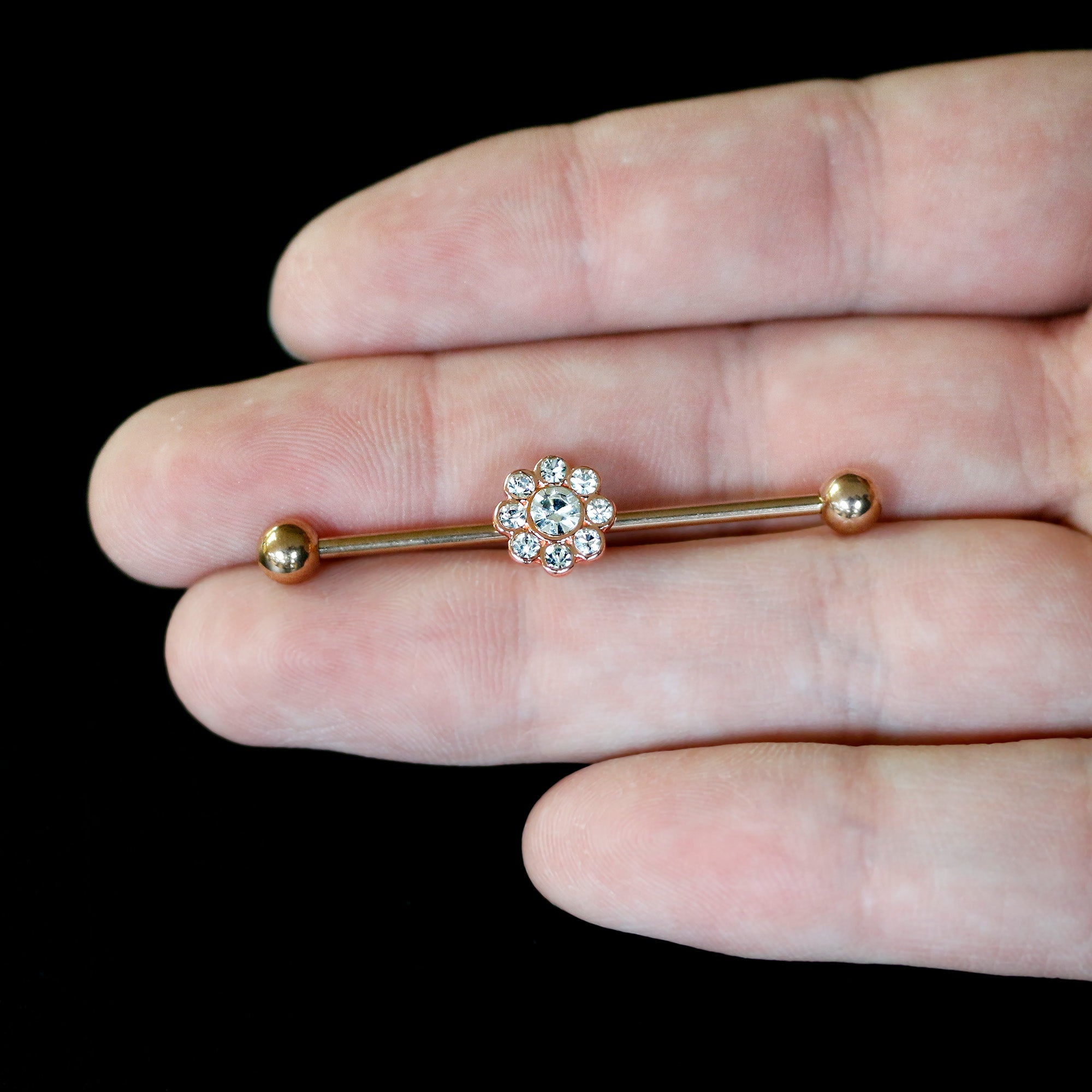 BodyCandy 14G Clear Gem Rose Gold Hue Whimsy Flower Industrial Barbell 38mm — back view