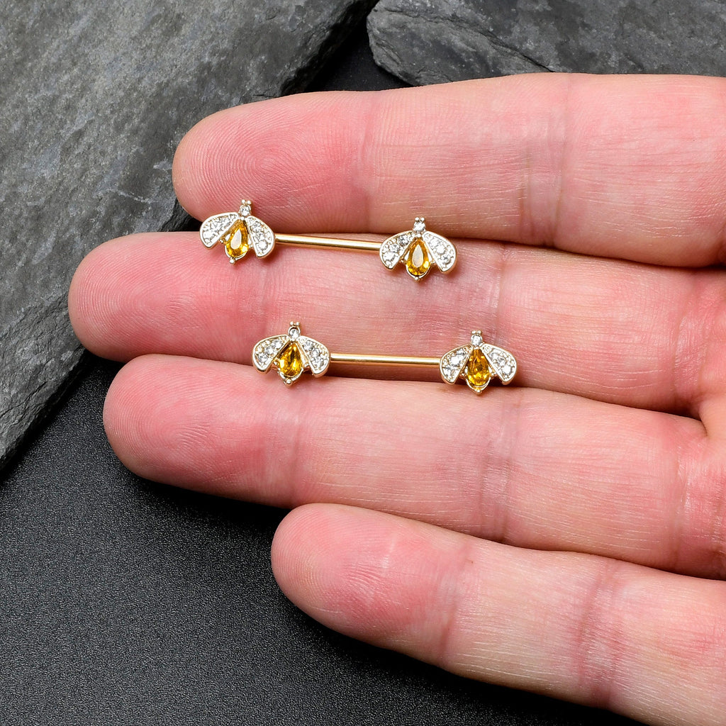 BodyCandy 14G 9/16 Yellow Gem Gold Tone Fashion Bug Barbell Nipple Ring Set — in-use photo
