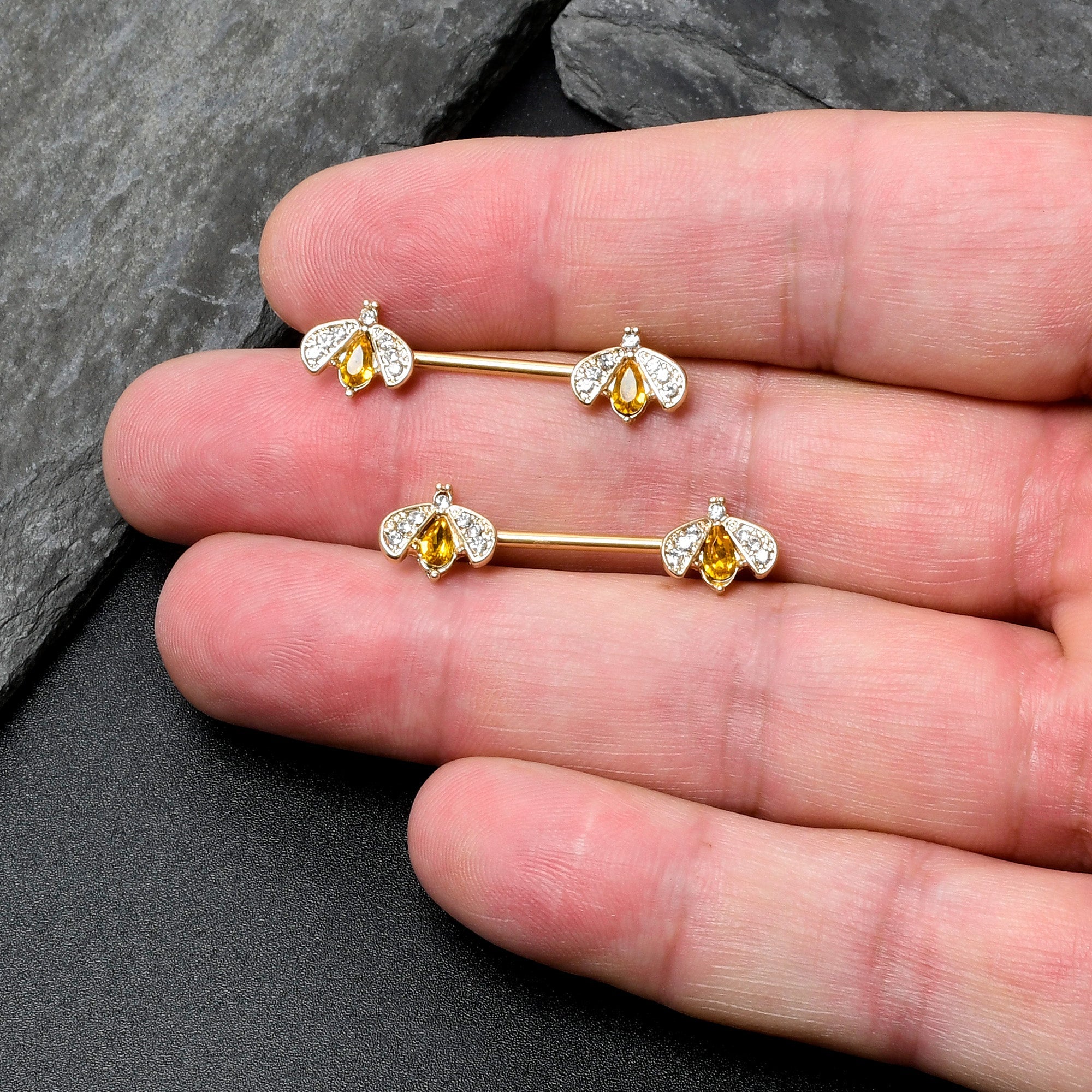BodyCandy 14G 9/16 Yellow Gem Gold Tone Fashion Bug Barbell Nipple Ring Set — in-use photo