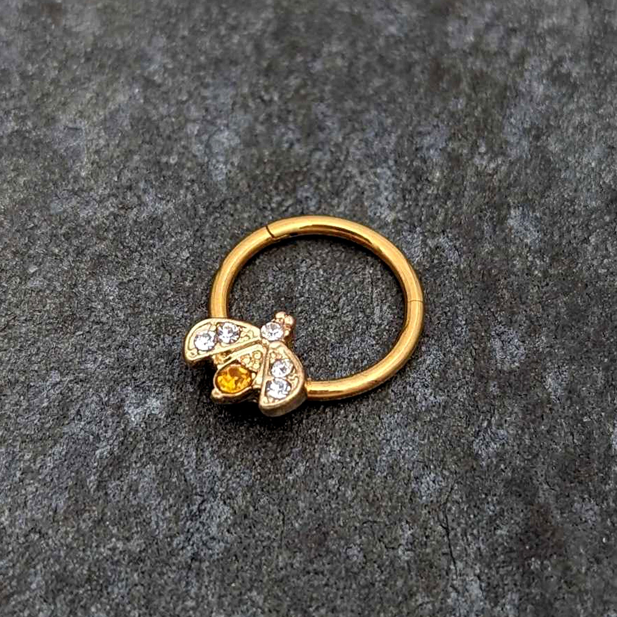 BodyCandy 16G 3/8 Yellow Gem Gold Tone Fashion Winged Bug Hinged Segment Ring — alternative angle