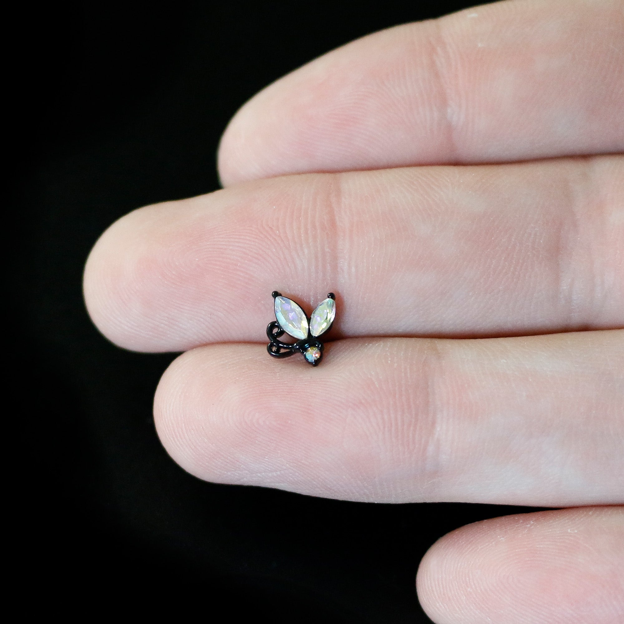 BodyCandy 16G 5/16 Aurora CZ Gem Black Fleur de Lis Butterfly Labret Monroe Tragus — in-use photo
