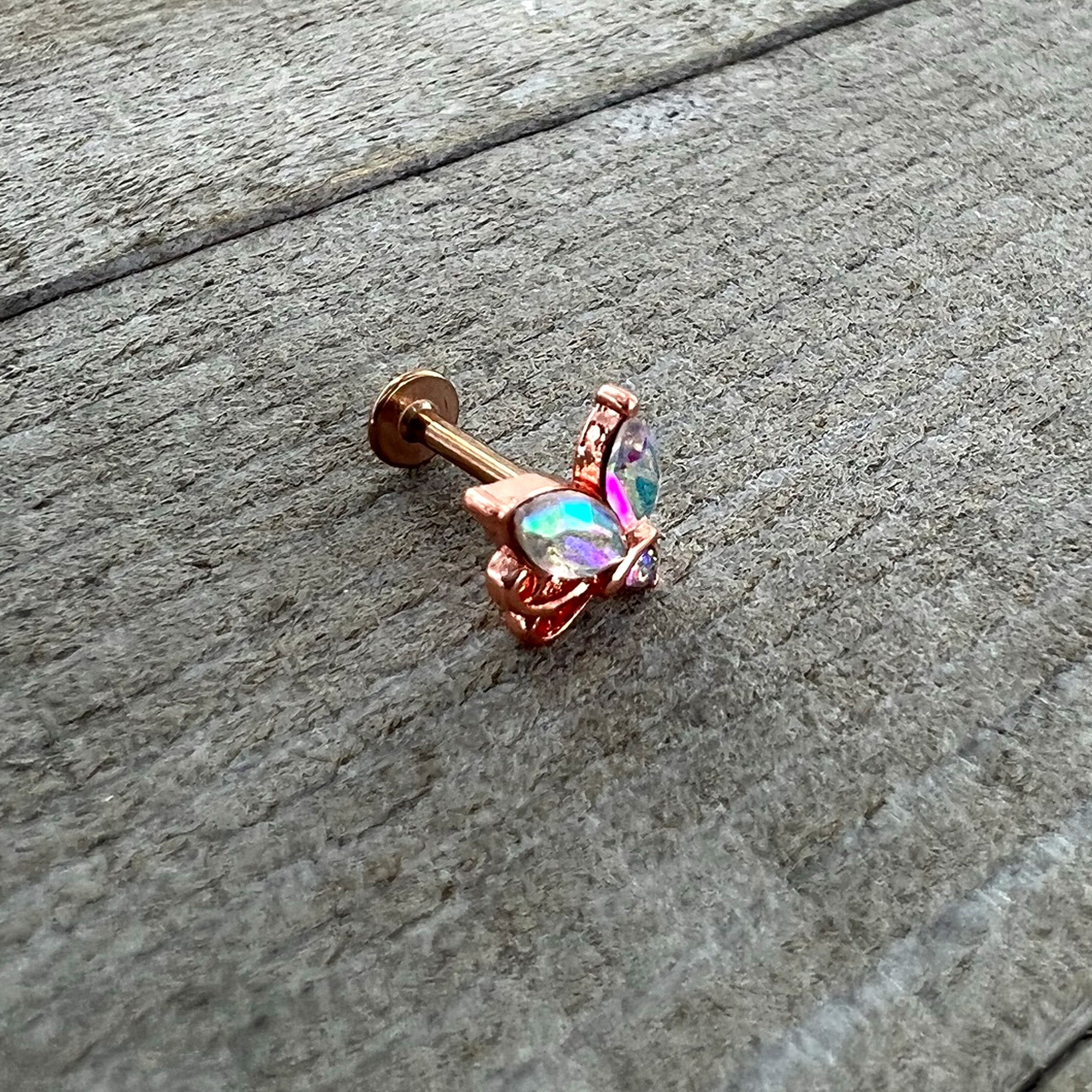 BodyCandy 16G 5/16 Aurora CZ Gem Rosy Tone Fleur de Lis Butterfly Labret Monroe Tragus — alternative angle