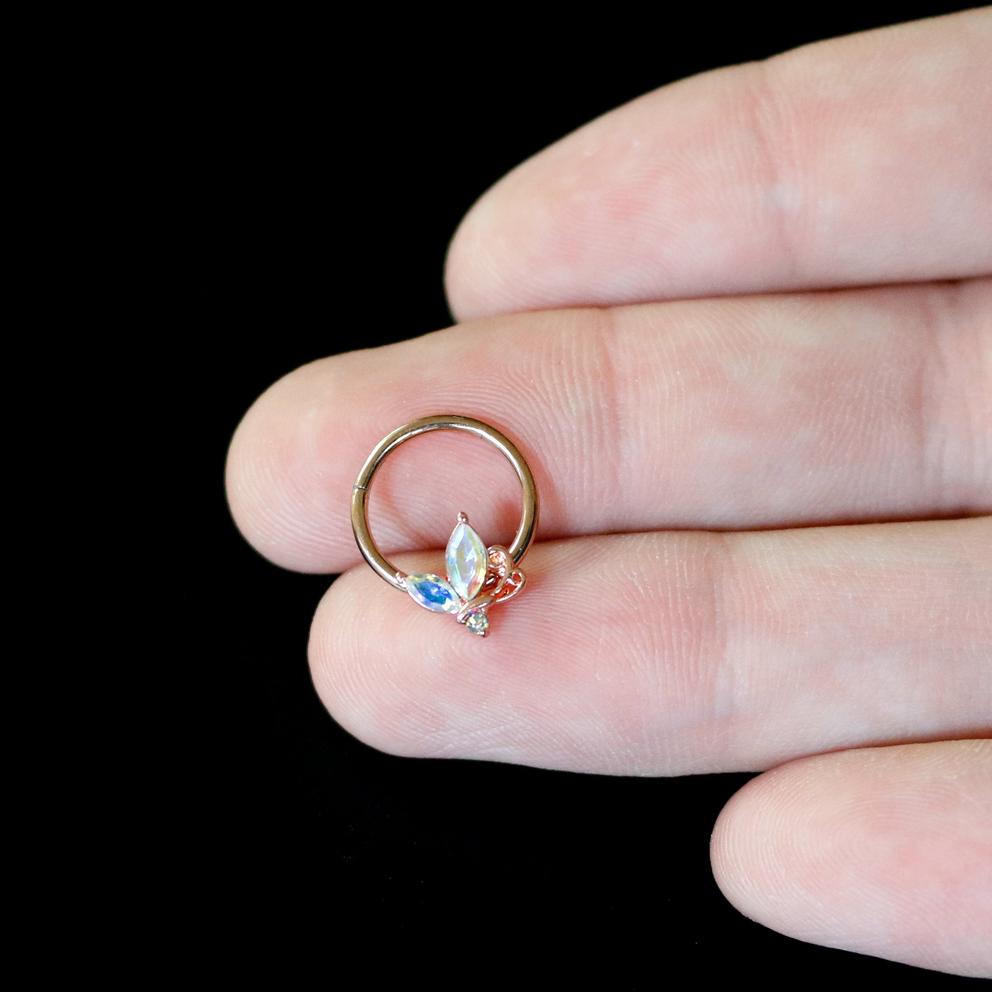 BodyCandy 16G 3/8 Aurora CZ Gem Rosy Tone Fleur de Lis Butterfly Hinged Segment Ring — back view