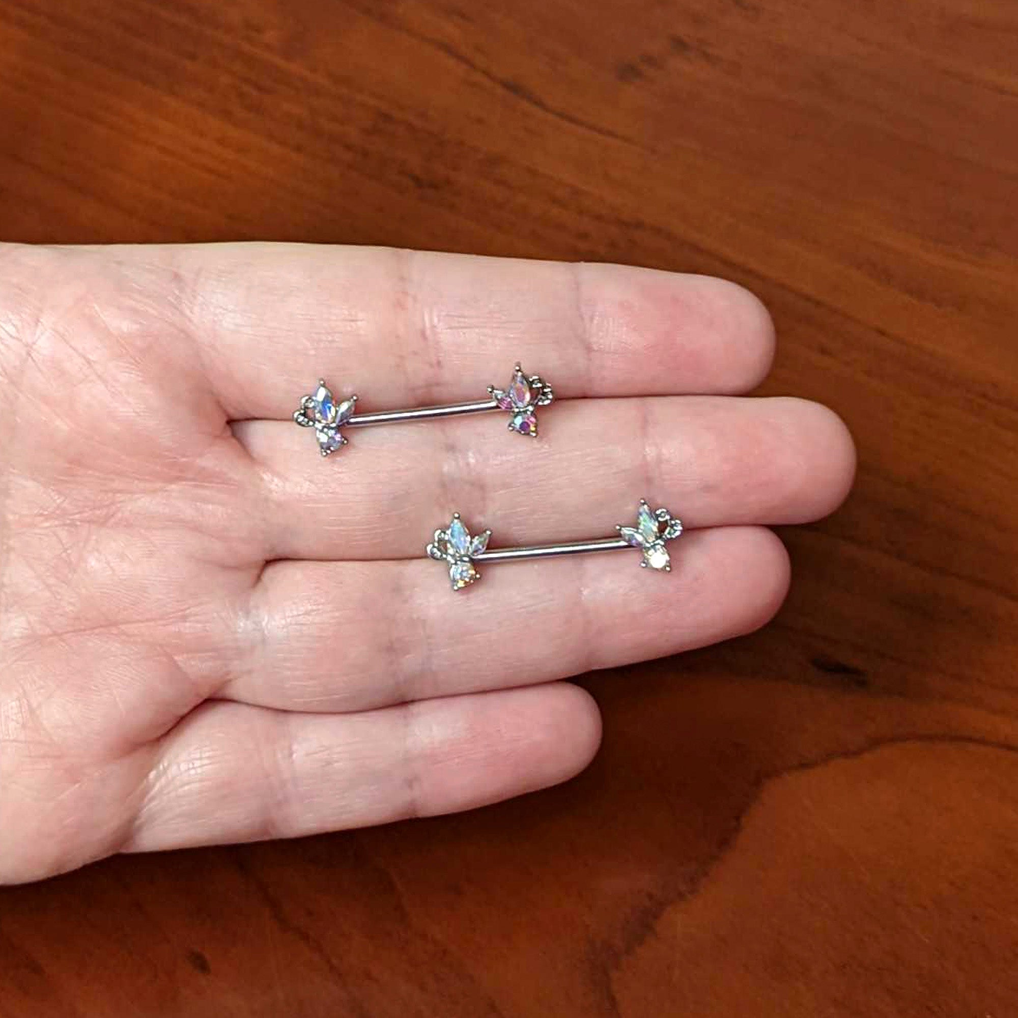 BodyCandy 14G 9/16 Aurora CZ Gem Fleur de Lis Butterfly Barbell Nipple Ring Set — side view