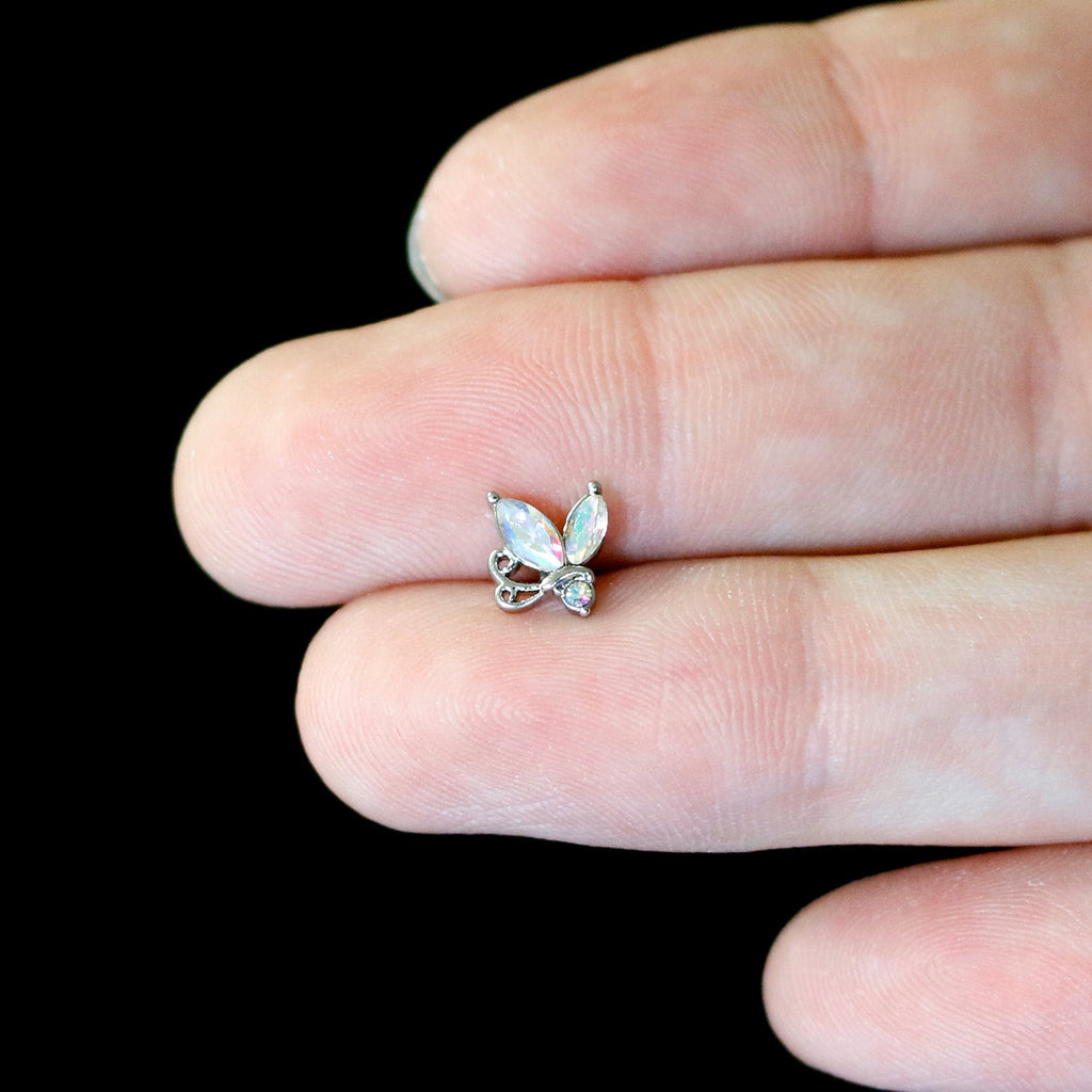 BodyCandy 16G 1/4 Aurora CZ Gem Fleur de Lis Butterfly Cartilage Tragus Earring — in-use photo