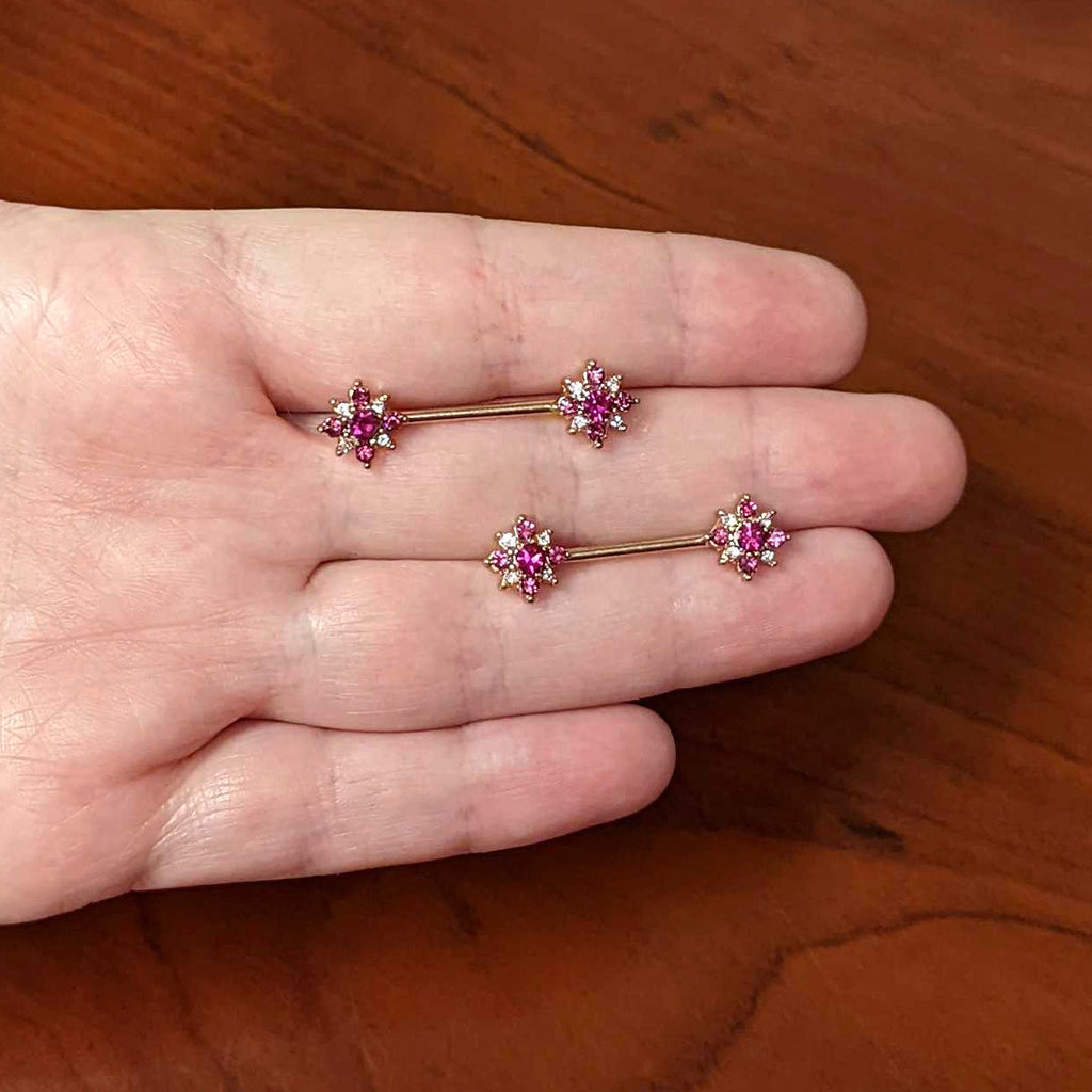 BodyCandy 14G Red Gem Rose Gold Tone Rococo Star Barbell Nipple Ring Set — side view