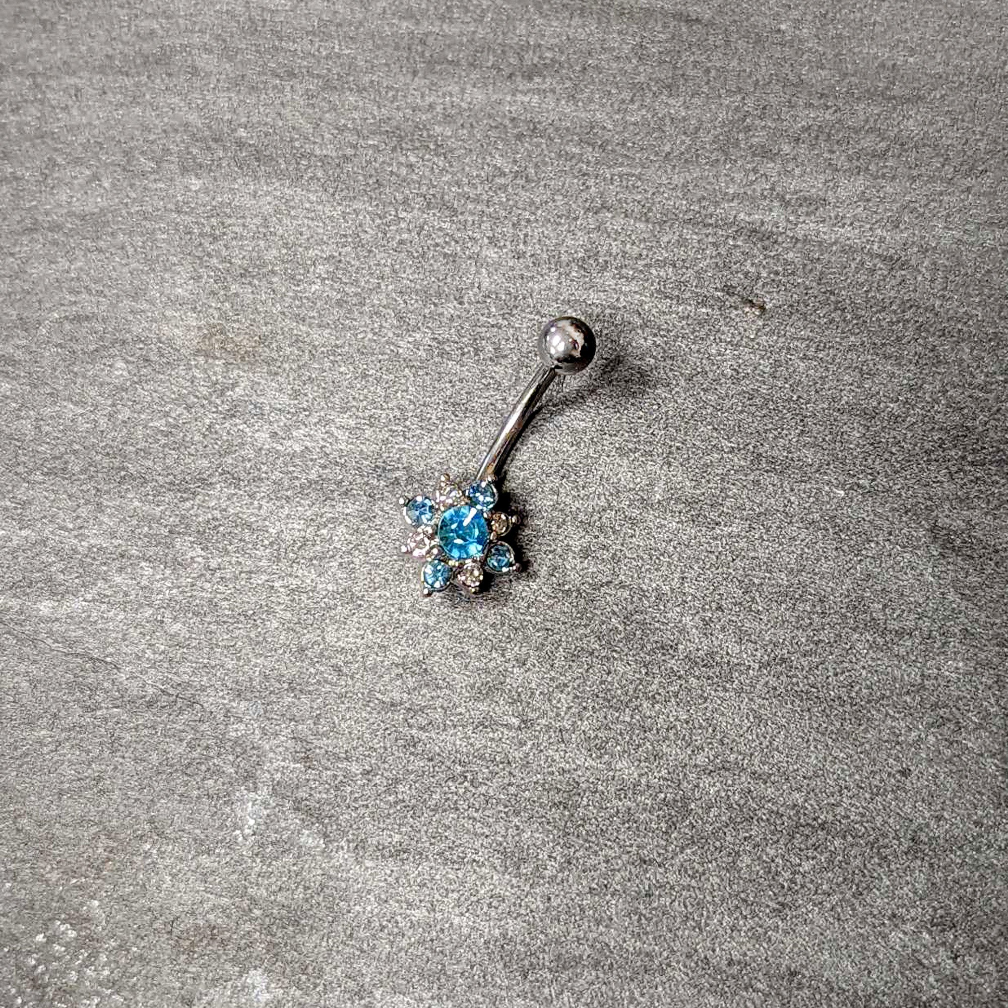 BodyCandy Blue Clear Gem Stylish Snowflake Holiday Belly Ring — back view