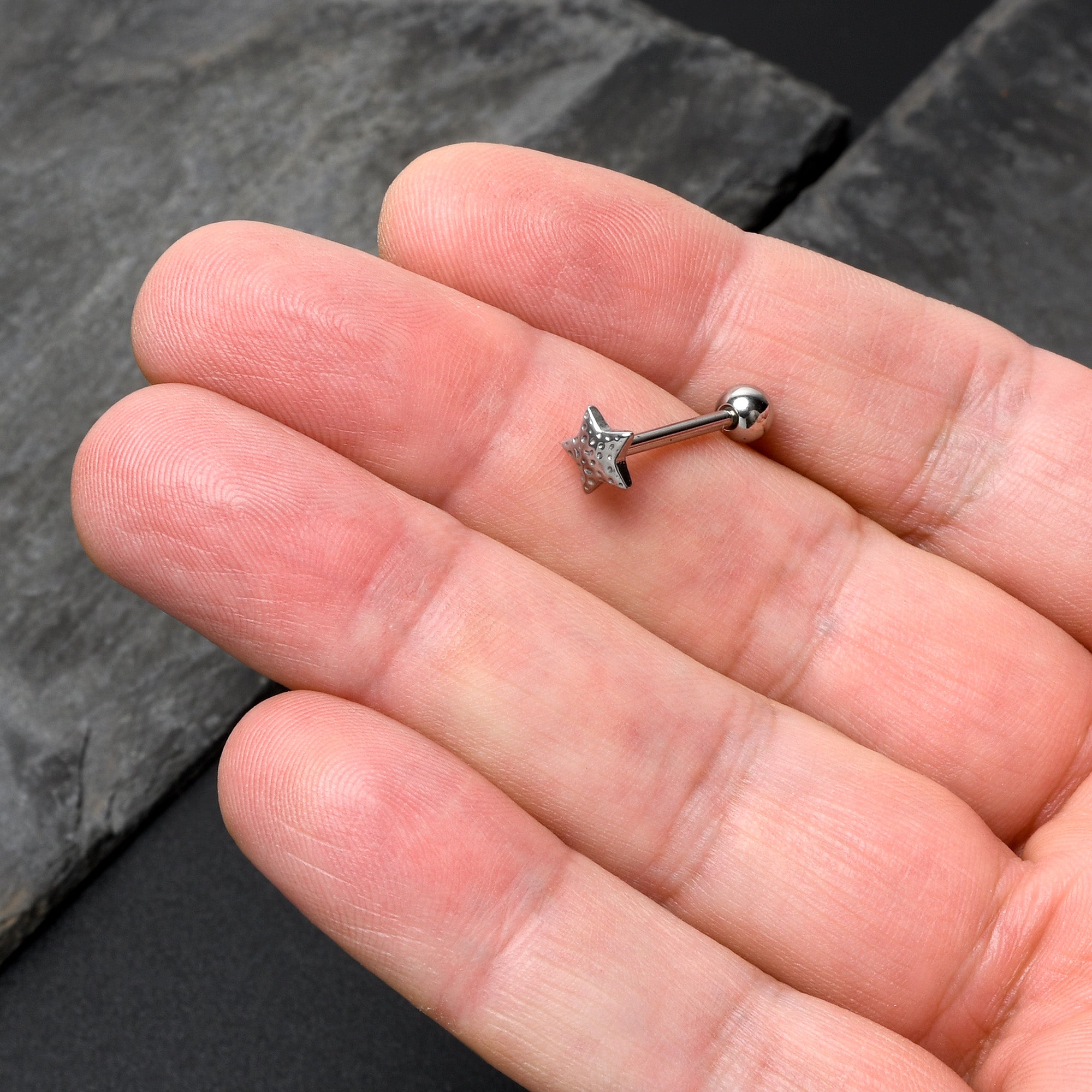 BodyCandy 316L Surgical Steel Texture Star Barbell Tongue Ring — in-use photo