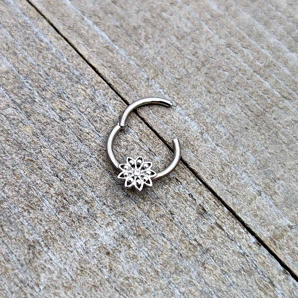 BodyCandy 16G 3/8 Clear Gem Starry Flower Hinged Segment Ring — in-use photo