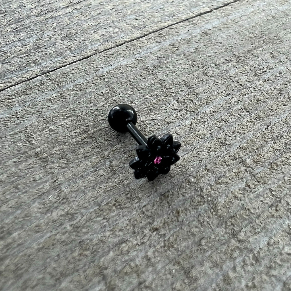 BodyCandy 16G 1/4 Pink Gem Black Midnight Flower Cartilage Tragus Earring — in-use photo