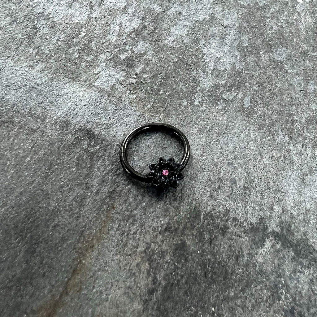 BodyCandy 16G 3/8 Pink Gem Black Starry Flower Hinged Segment Ring — side view