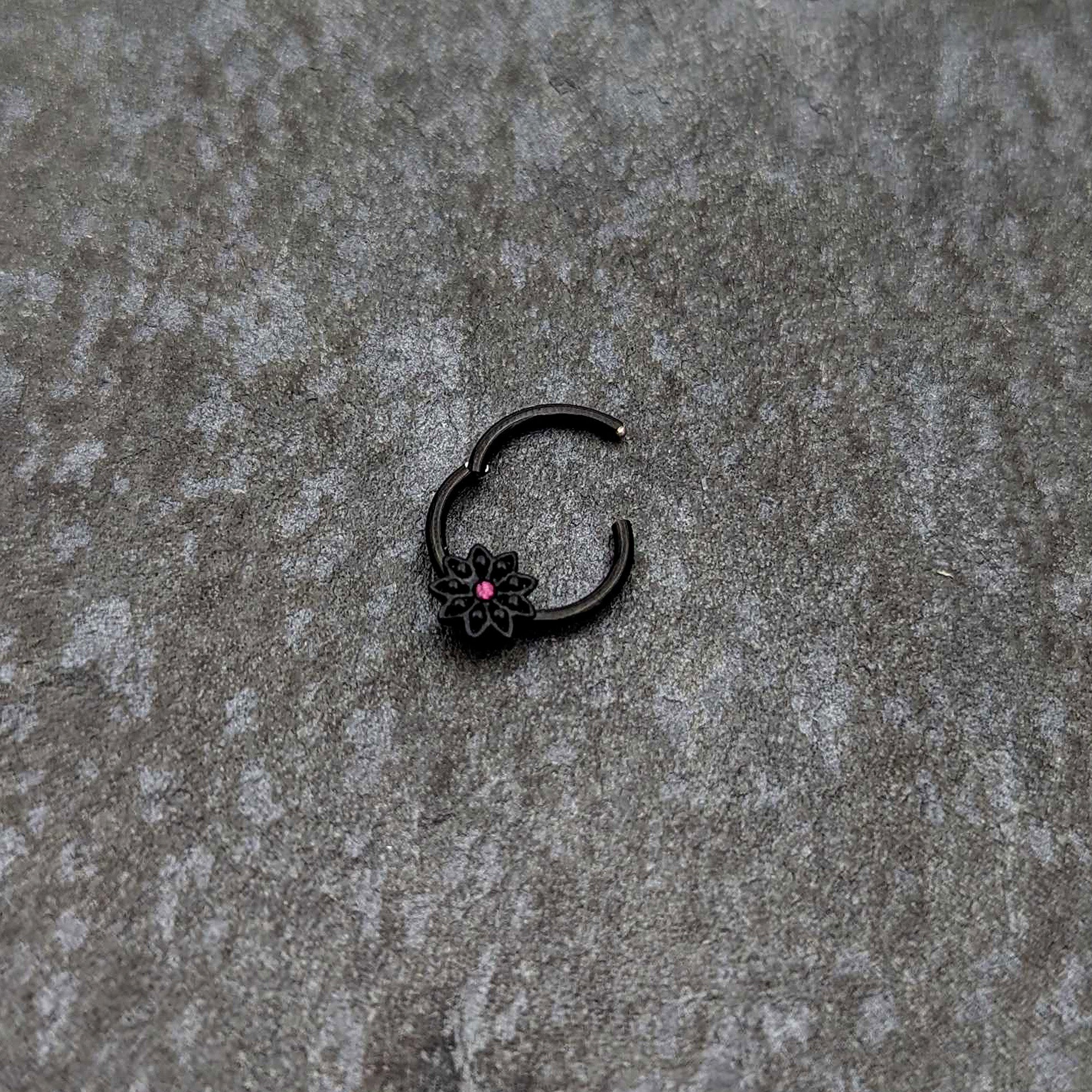 BodyCandy 16G 3/8 Pink Gem Black Starry Flower Hinged Segment Ring — back view