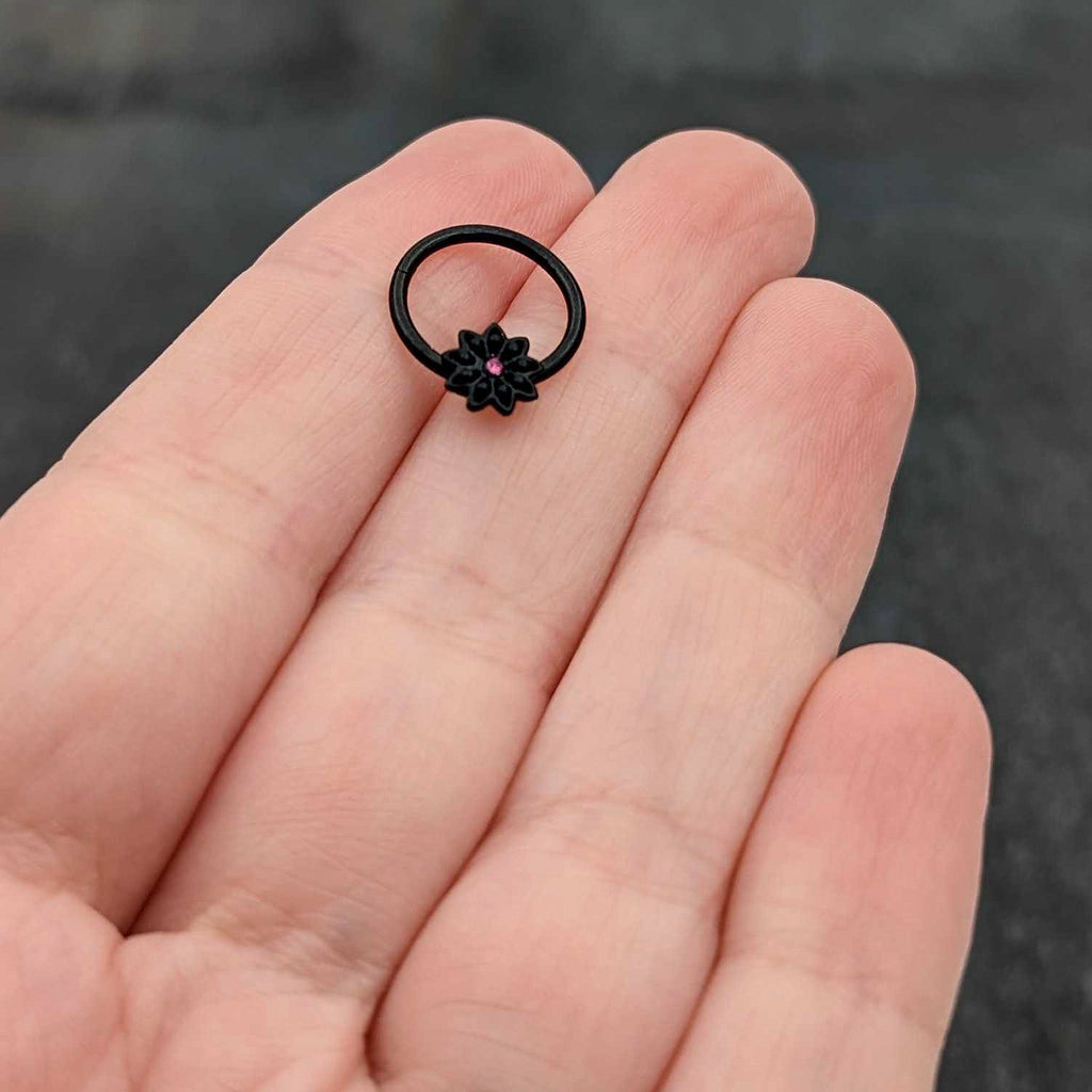 BodyCandy 16G 3/8 Pink Gem Black Starry Flower Hinged Segment Ring — size reference
