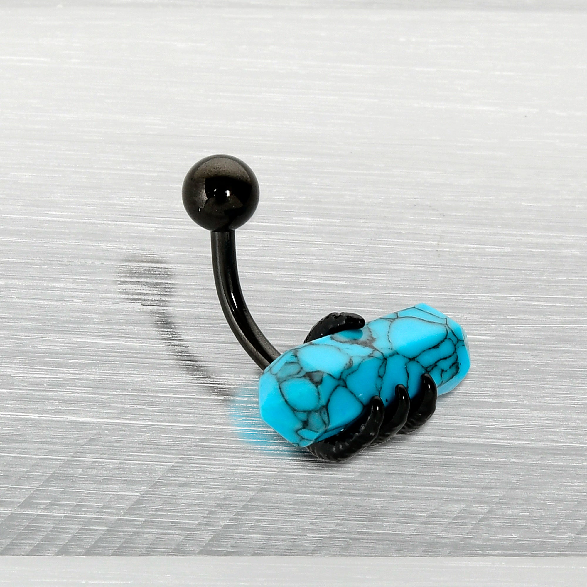 BodyCandy Blue Turquoise Stone Black Claw Belly Ring — in-use photo