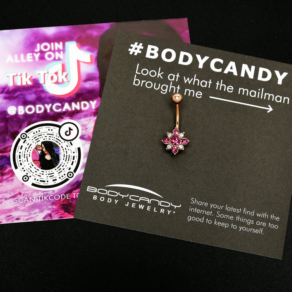 BodyCandy Pink Clear Gem Rose Gold Tone Rococo Star Belly Ring — side view
