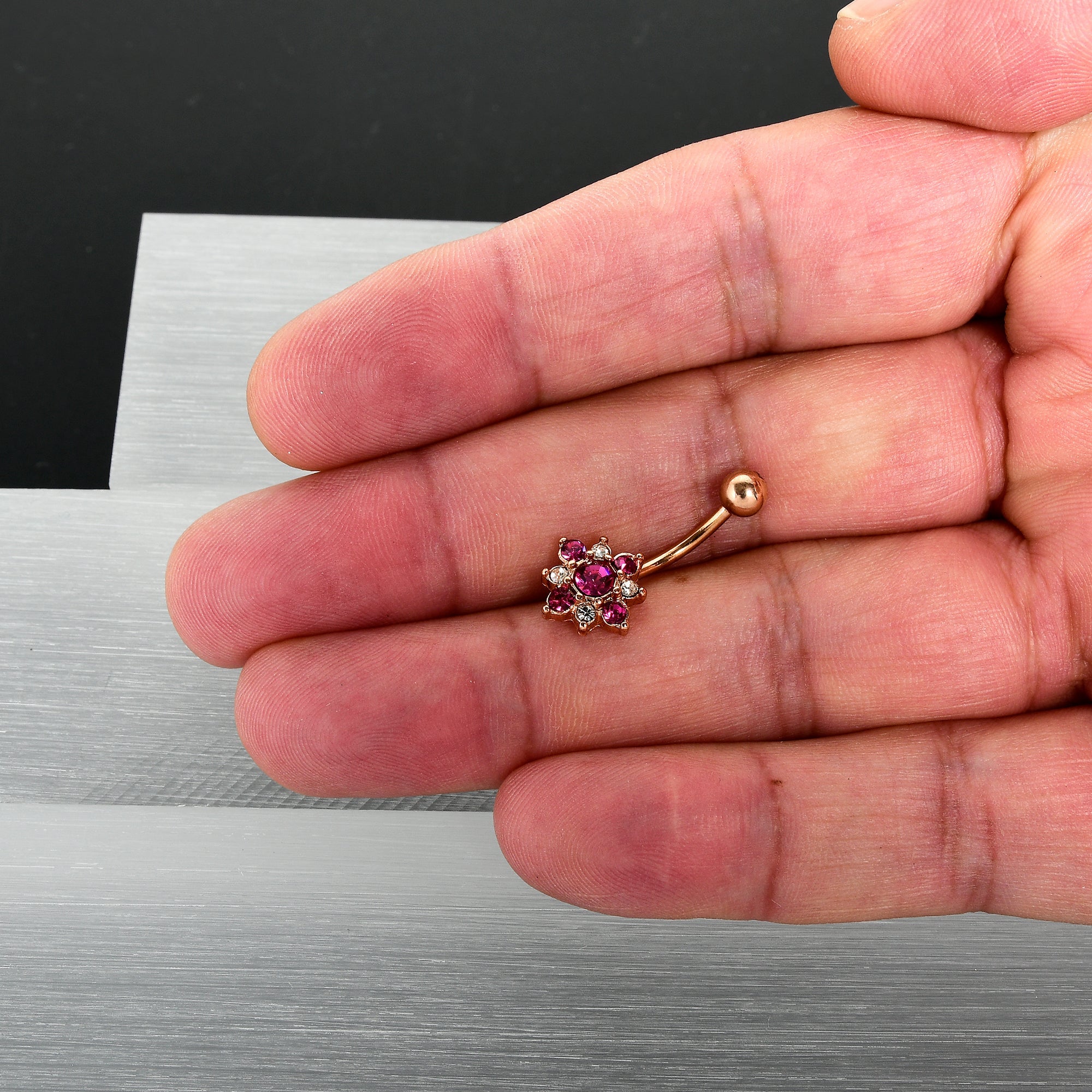 BodyCandy Pink Clear Gem Rose Gold Tone Rococo Star Belly Ring — size reference