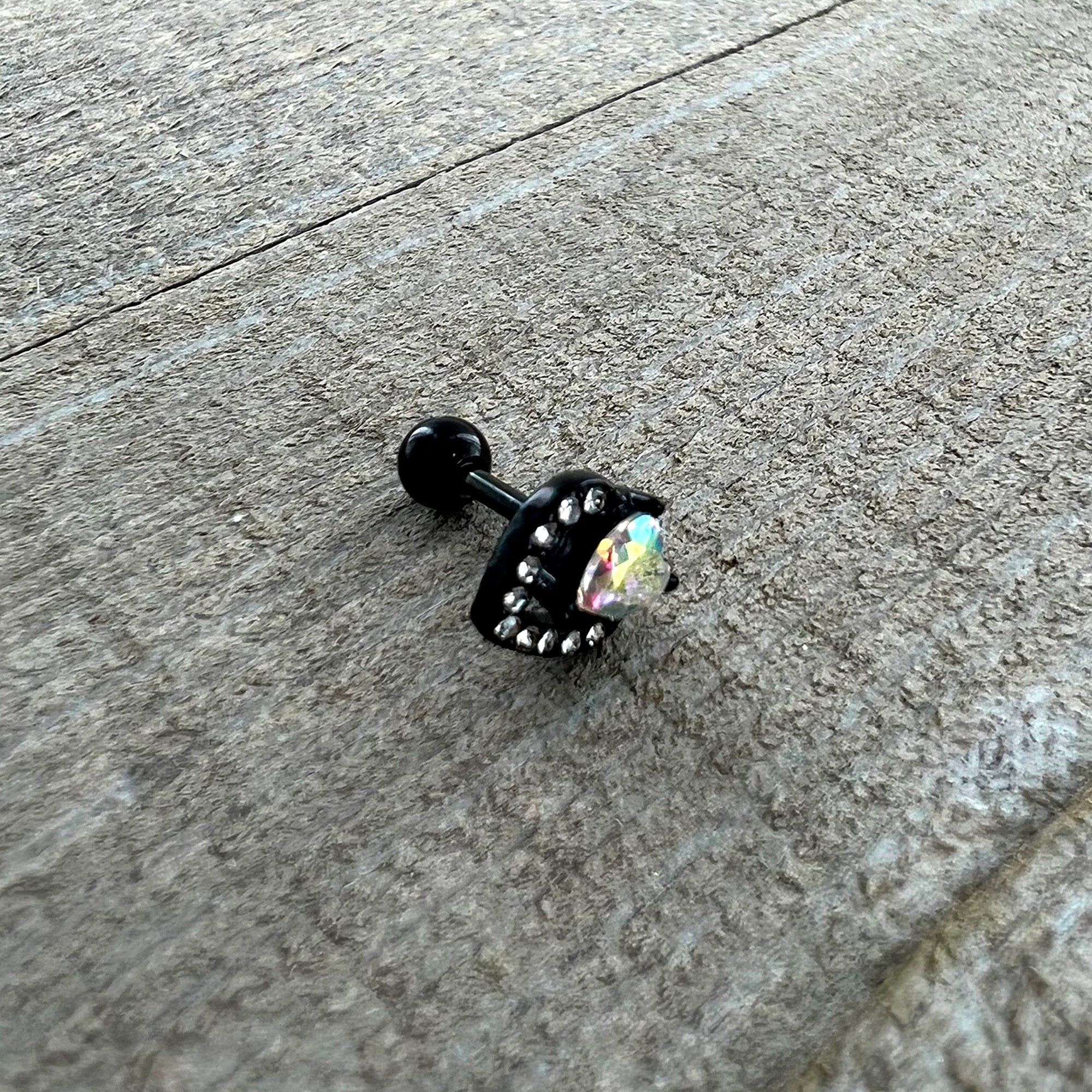 BodyCandy 16G 1/4 Aurora Gem Black Double Heart Cartilage Tragus Earring — in-use photo