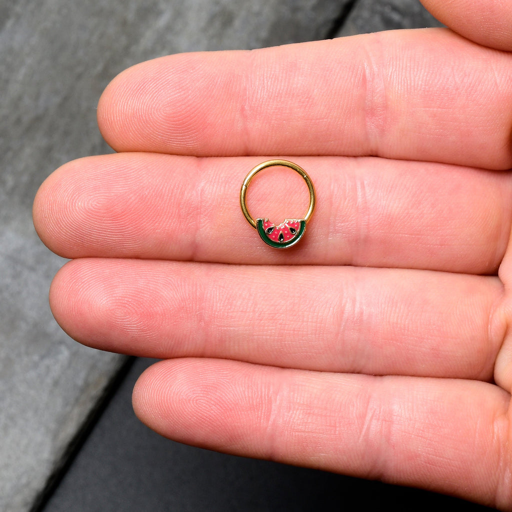 BodyCandy 16G 3/8 Gold Tone Watermelon Bite Hinged Segment Ring — lifestyle context