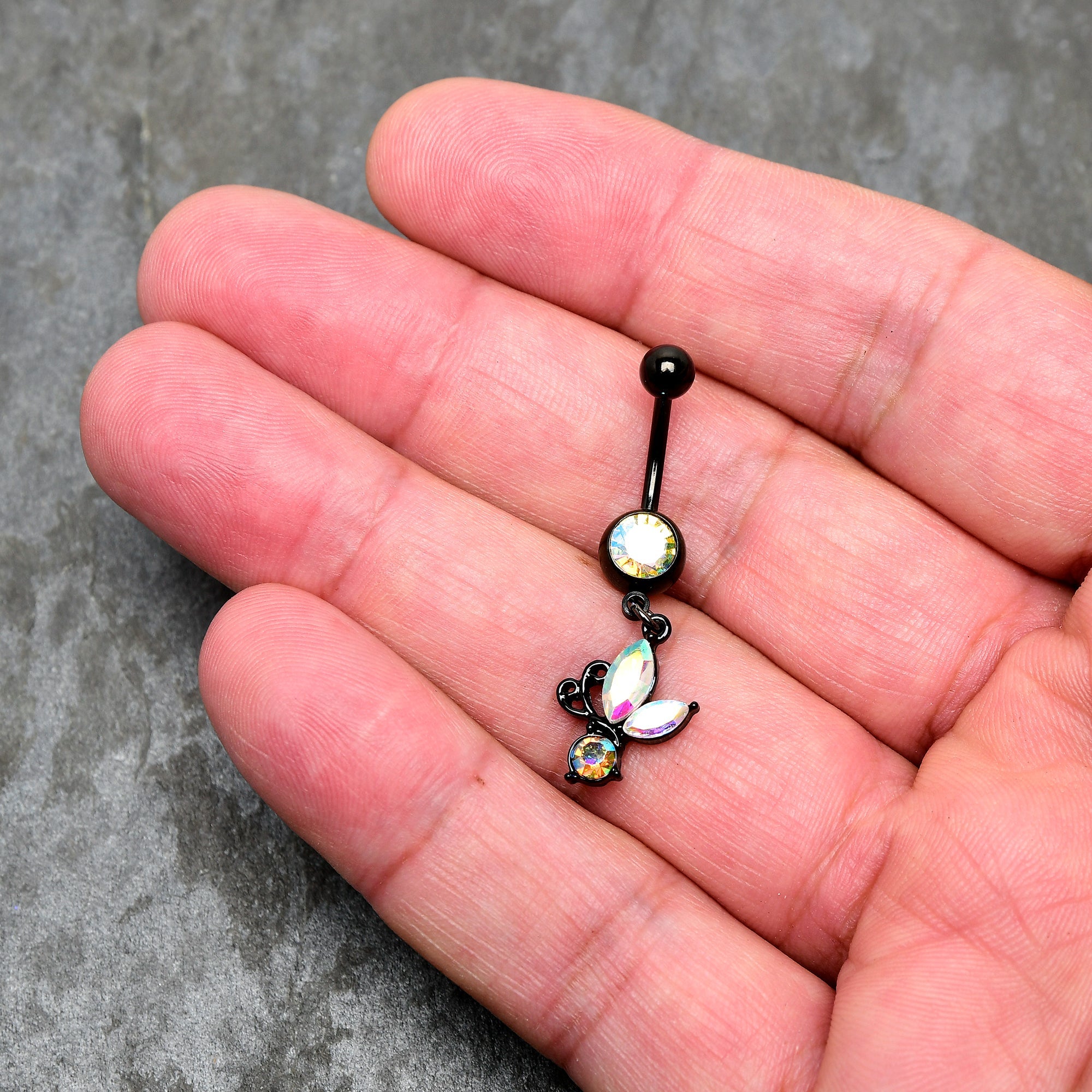 BodyCandy Aurora Gem Black Fleur de Lis Butterfly Dangle Belly Ring — detail close-up