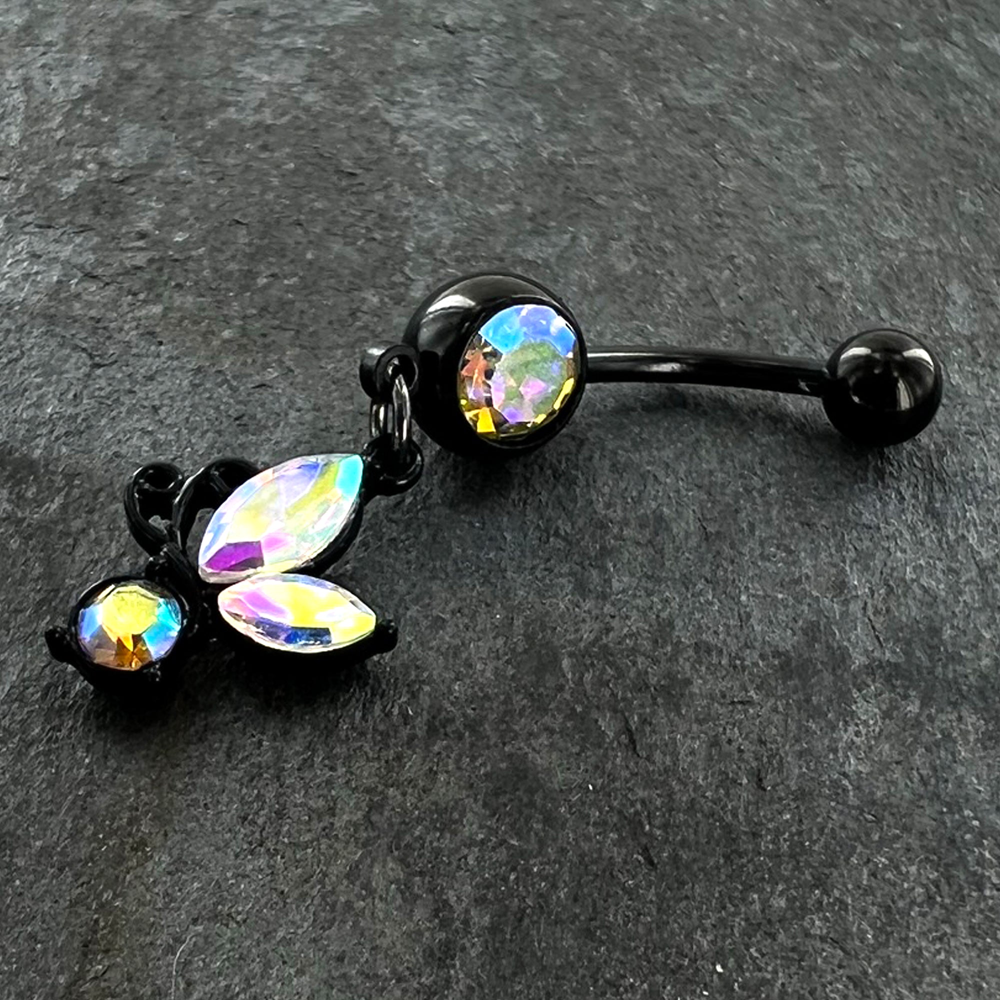 BodyCandy Aurora Gem Black Fleur de Lis Butterfly Dangle Belly Ring — in-use photo