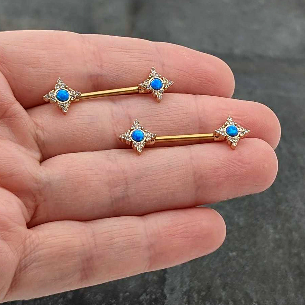 BodyCandy 14G 9/16 Blue Synthetic Opal Gold Tone Rhombus Nipple Ring Set — in-use photo