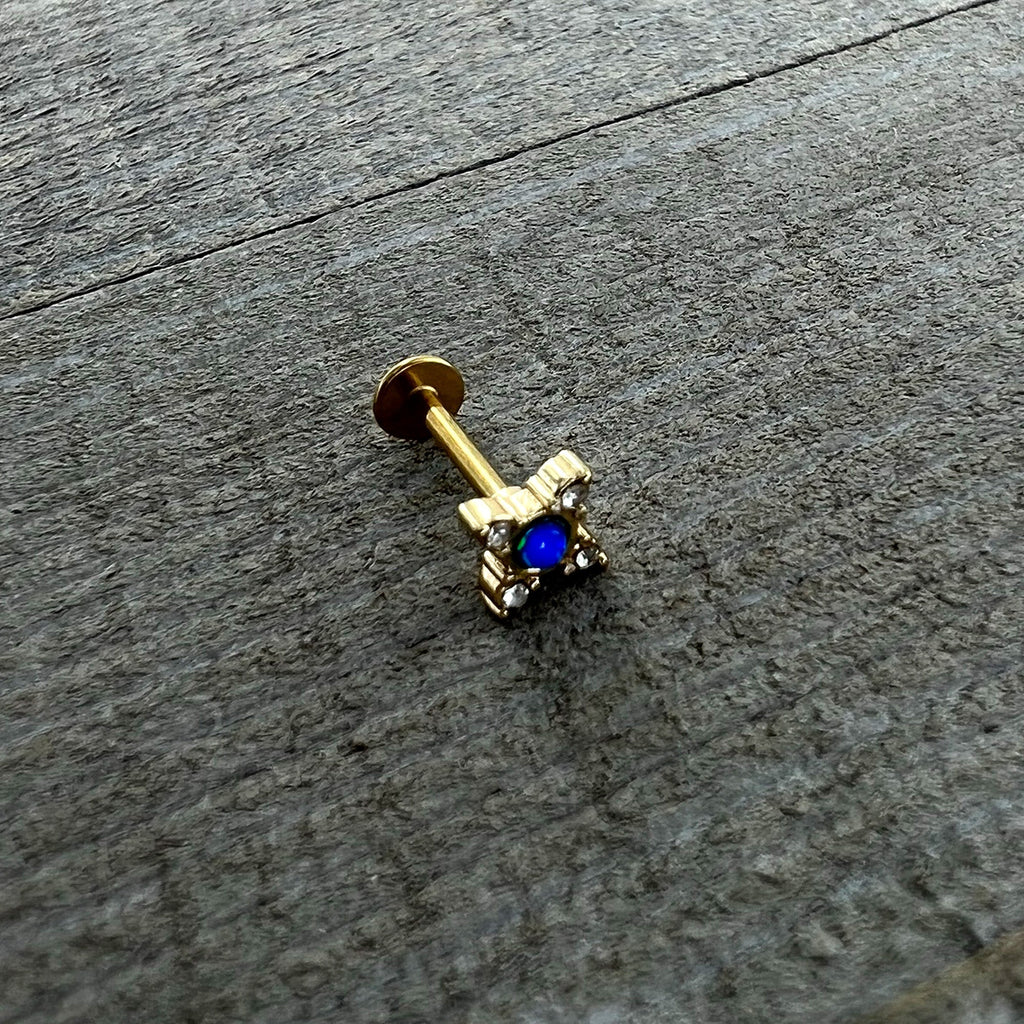 BodyCandy 16G 5/16 Blue Synthetic Opal Gold Hue Rhombus Labret Monroe Tragus — in-use photo