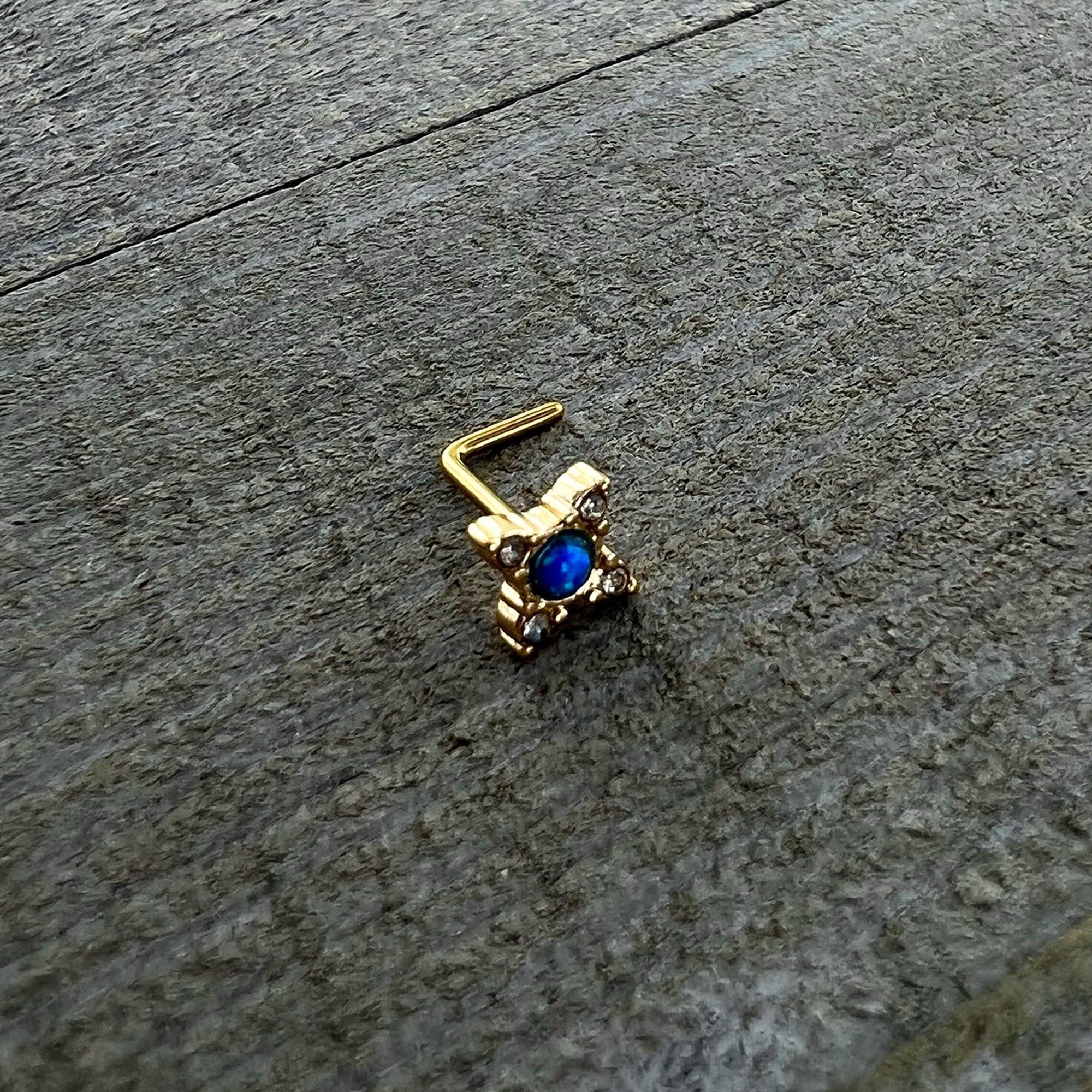 BodyCandy 20G 1/4 Blue Synthetic Opal Gold Hue Rhombus L Shape Nose Ring — in-use photo
