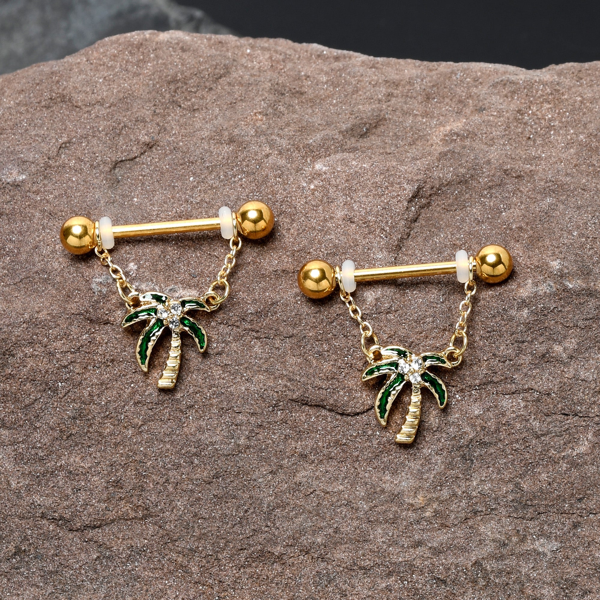 BodyCandy 14G 9/16 Clear Gem Gold Hue Palm Tree Style Dangle Nipple Ring Set — detail close-up