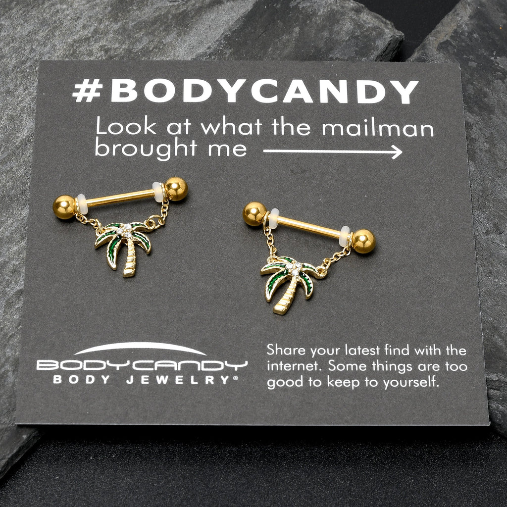 BodyCandy 14G 9/16 Clear Gem Gold Hue Palm Tree Style Dangle Nipple Ring Set — in-use photo