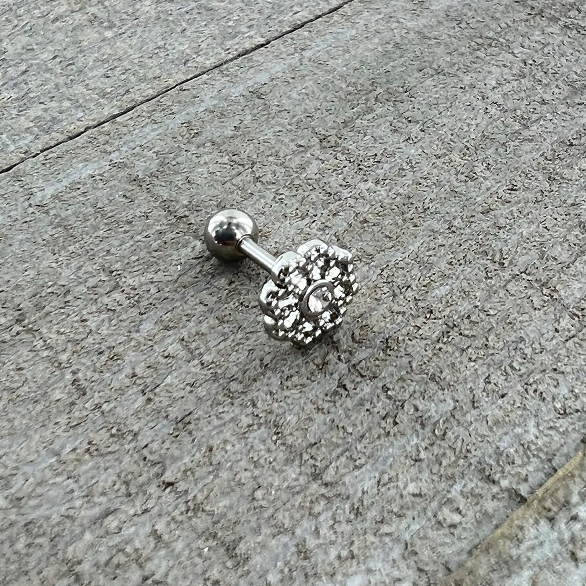 BodyCandy 16G 1/4 Clear Gem Baroque Fabulous Flower Cartilage Tragus Earring — in-use photo