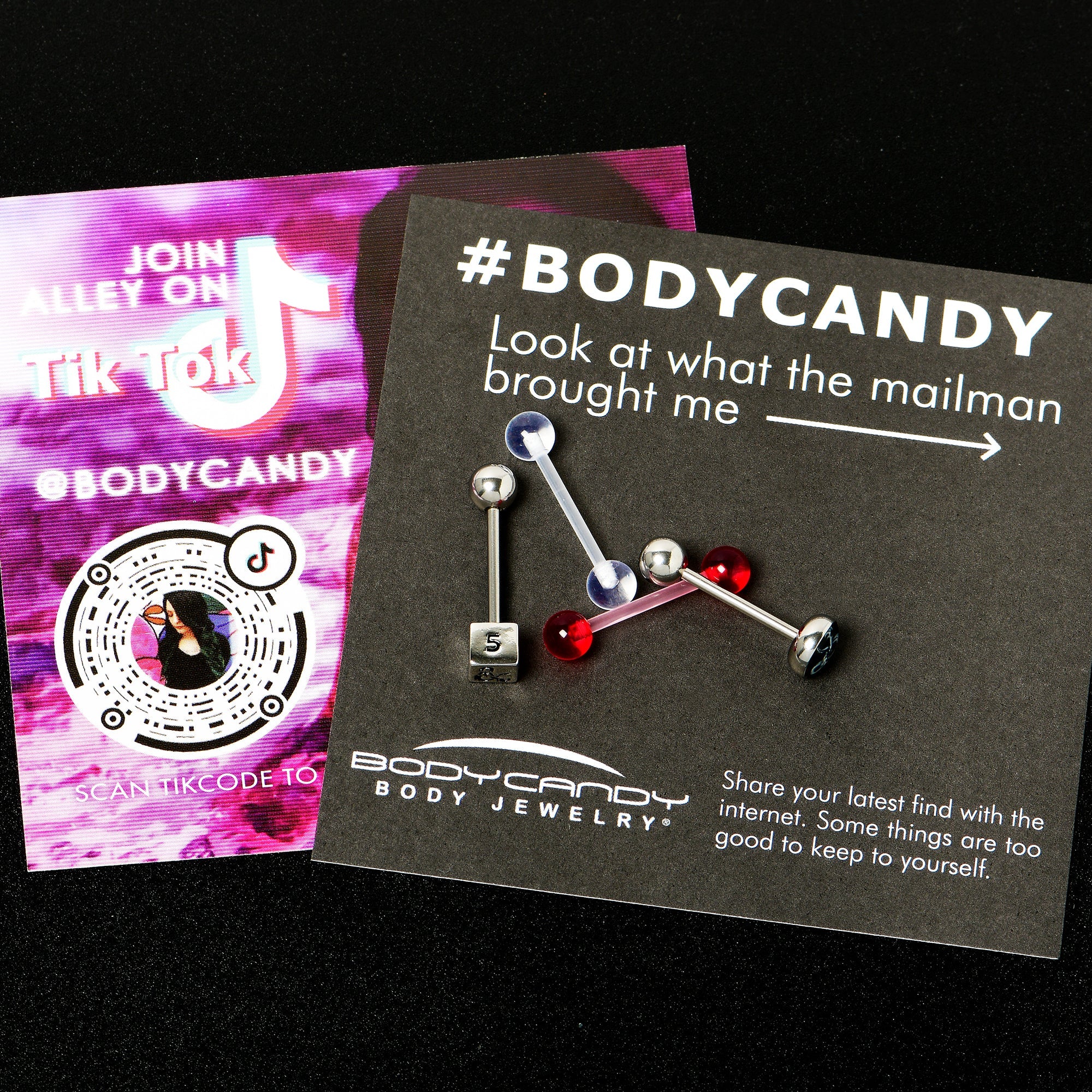 BodyCandy Licensed Dungeons & Dragons Dice Red Clear Barbell Tongue Ring Set of 4 — size reference