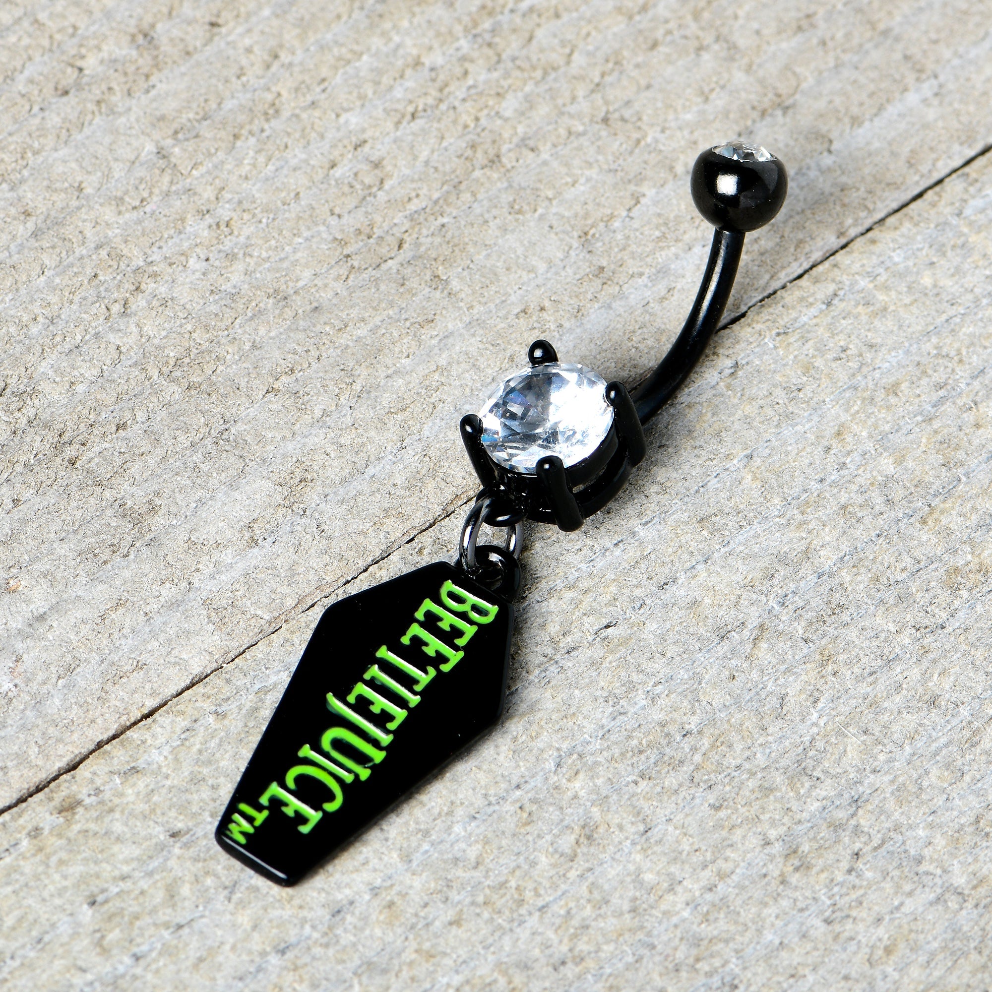 BodyCandy Clear Gem Black Officially Licensed Beetlejuice Coffin Dangle Belly Ring — back view