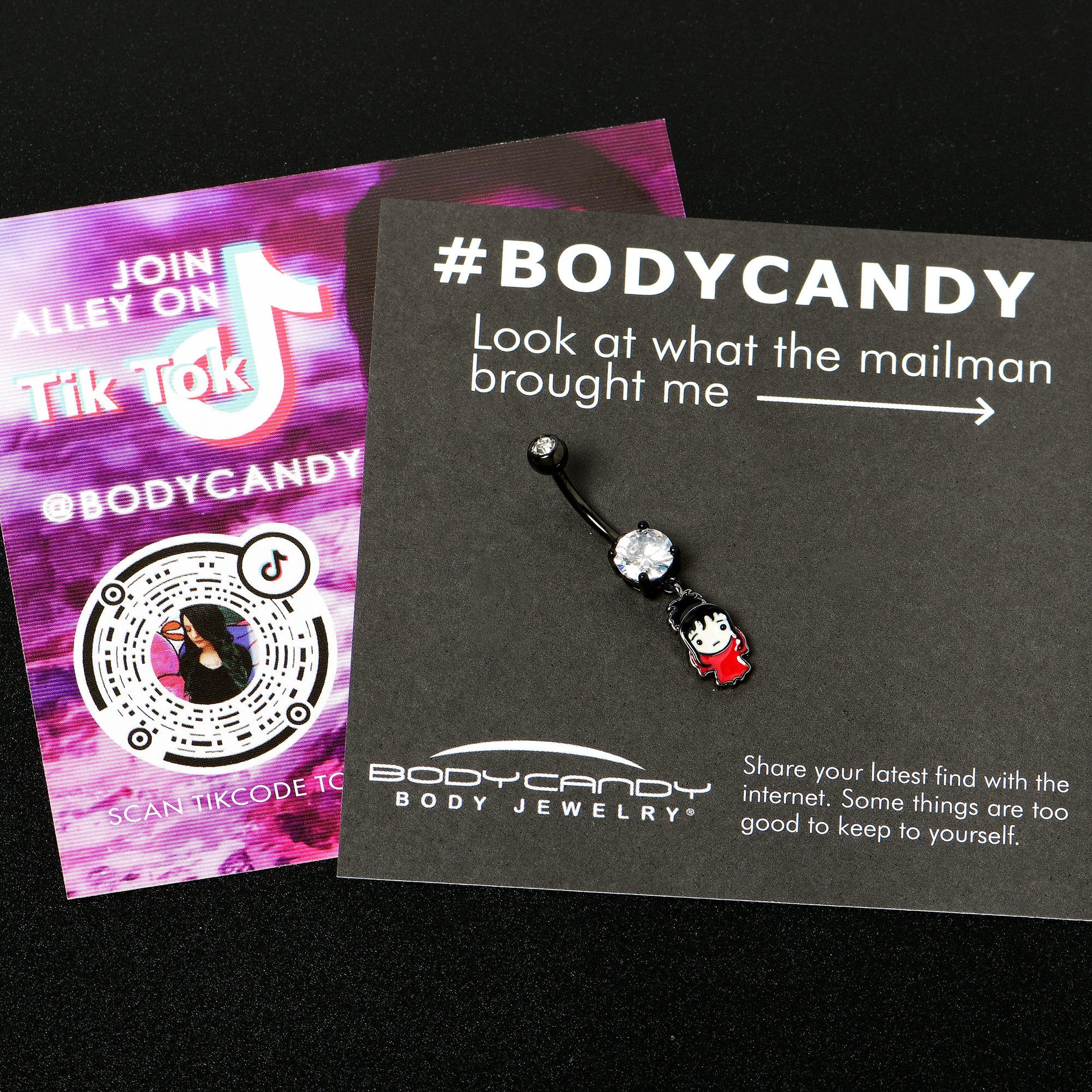 BodyCandy Clear Gem Black Officially Licensed Beetlejuice Lydia Dangle Belly Ring — side view