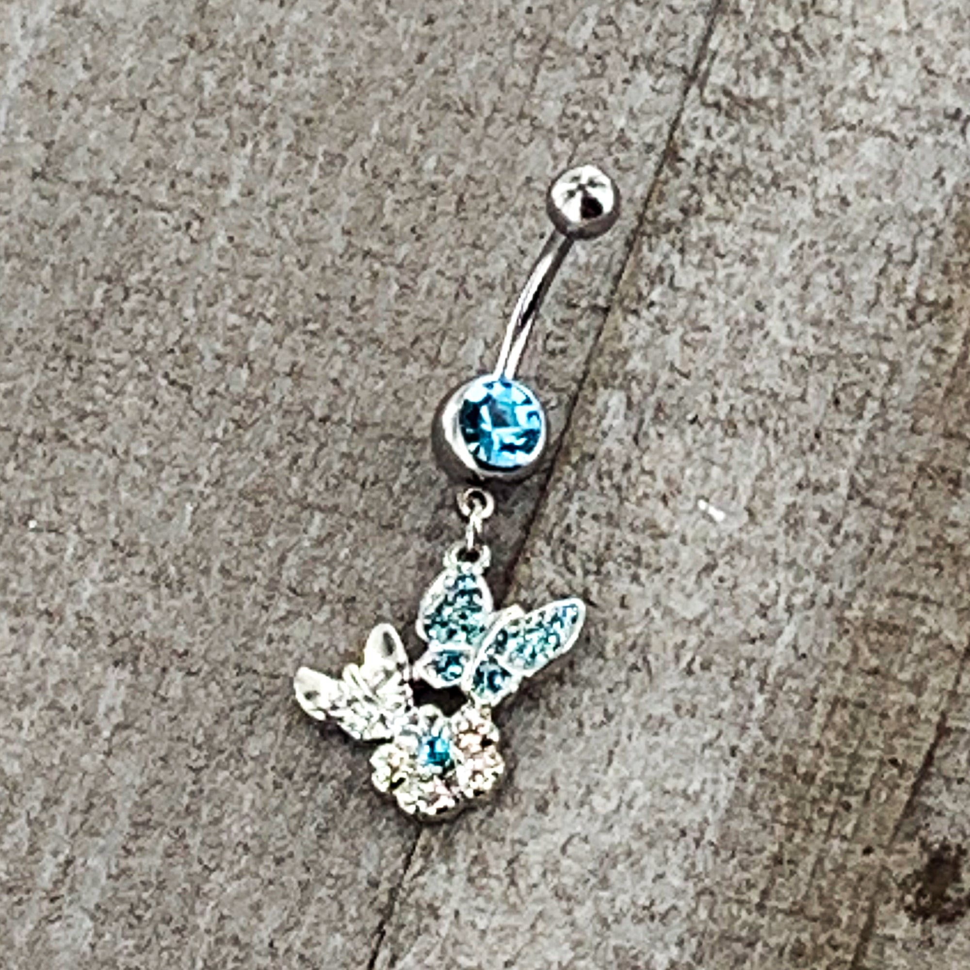 BodyCandy Blue Gem Butterflies Tiny Flower Dangle Belly Ring — back view