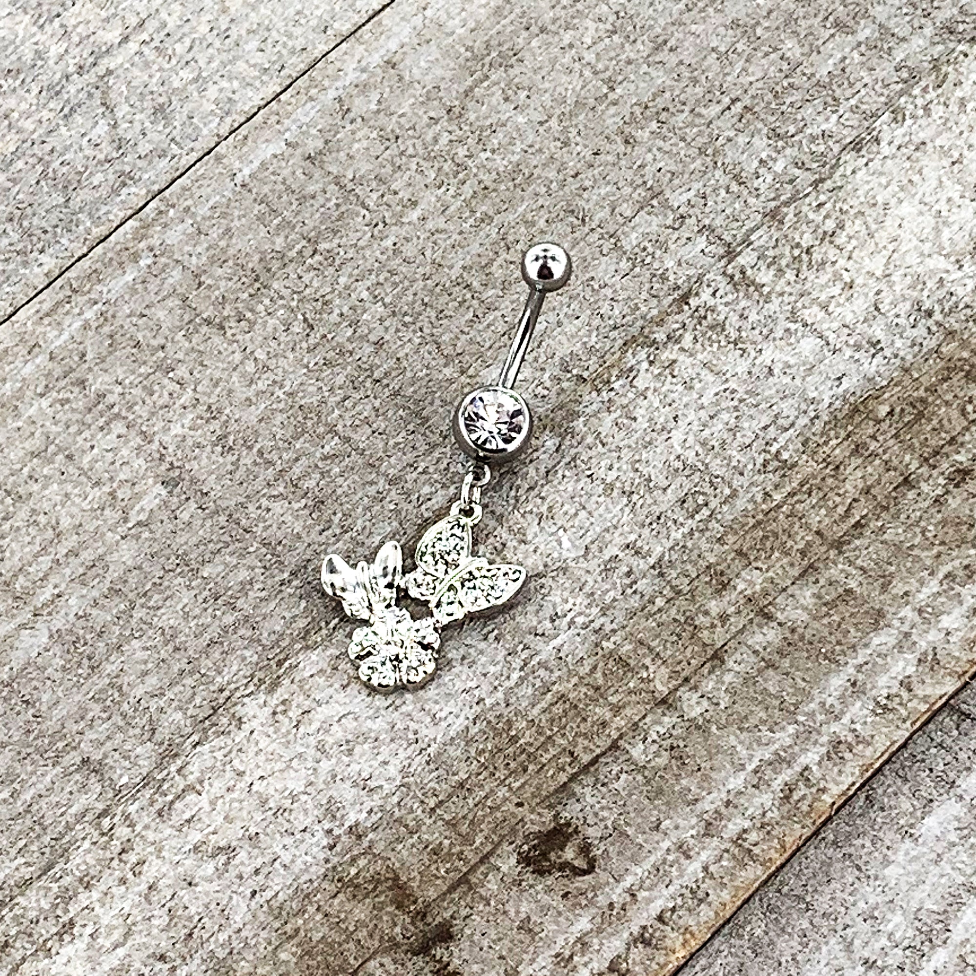 BodyCandy Clear Gem Butterflies Tiny Flower Dangle Belly Ring — size reference