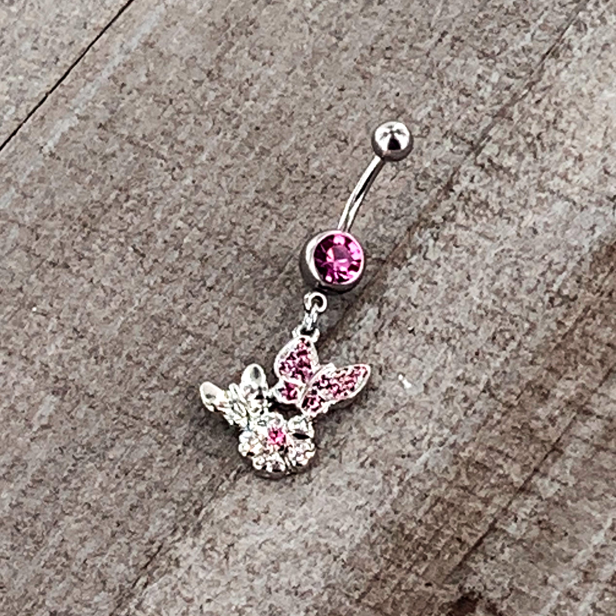 BodyCandy Pink Gem Butterflies Tiny Flower Dangle Belly Ring — size reference