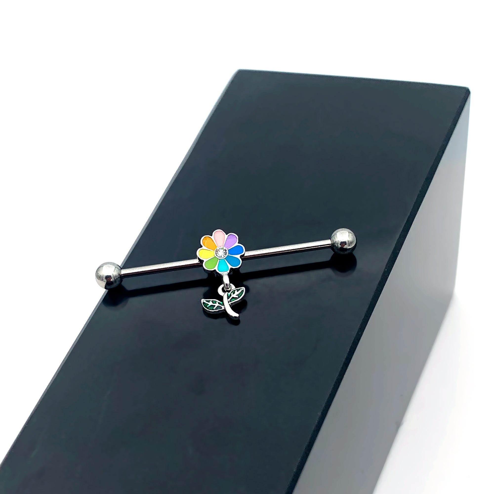 BodyCandy 14G Clear Gem Pride Rainbow Flower Dangle Industrial Barbell 38mm — in-use photo