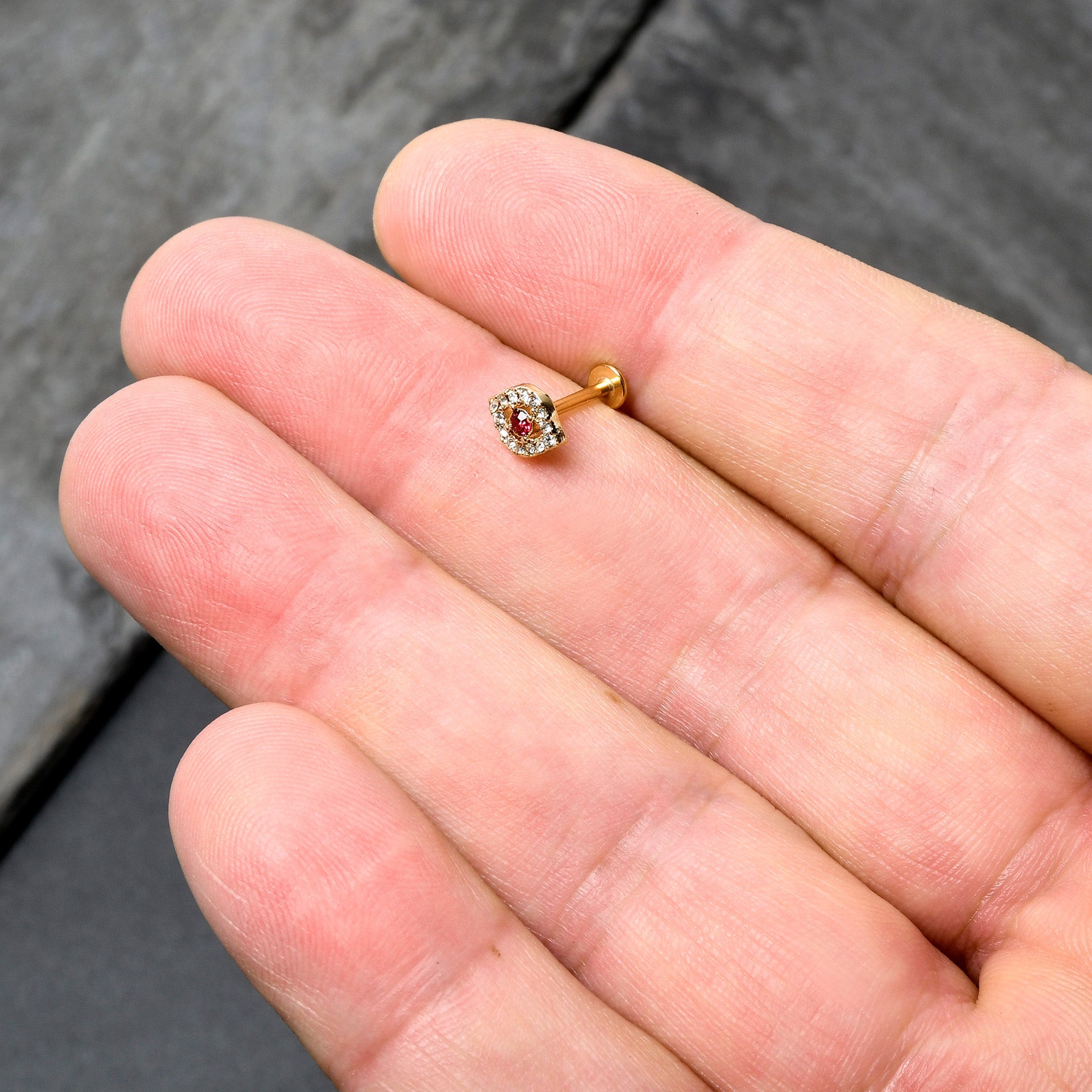 BodyCandy 16G 5/16 Clear Pink Gem Gold Tone Open Eye Labret Monroe Tragus — in-use photo