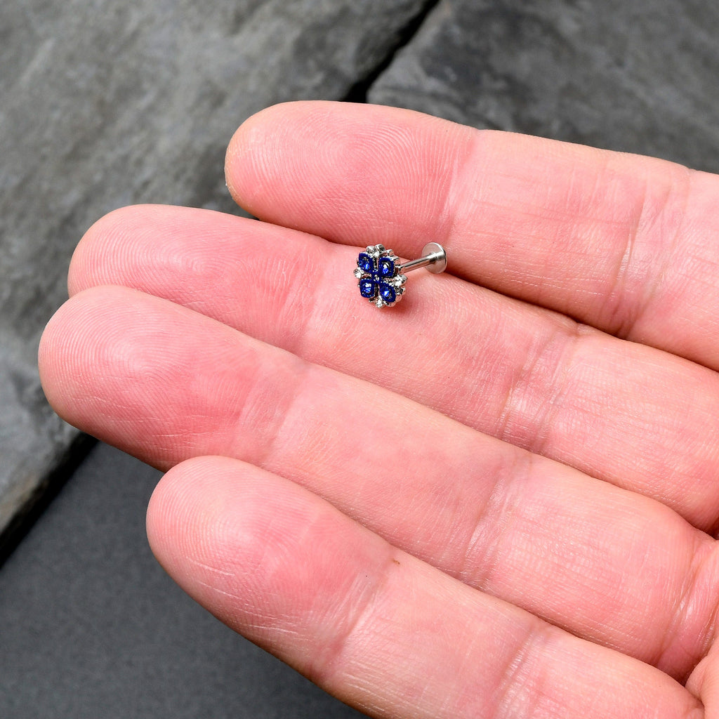 BodyCandy 16G 5/16 Blue Clear Gem Embellished Cross Labret Monroe Tragus — in-use photo