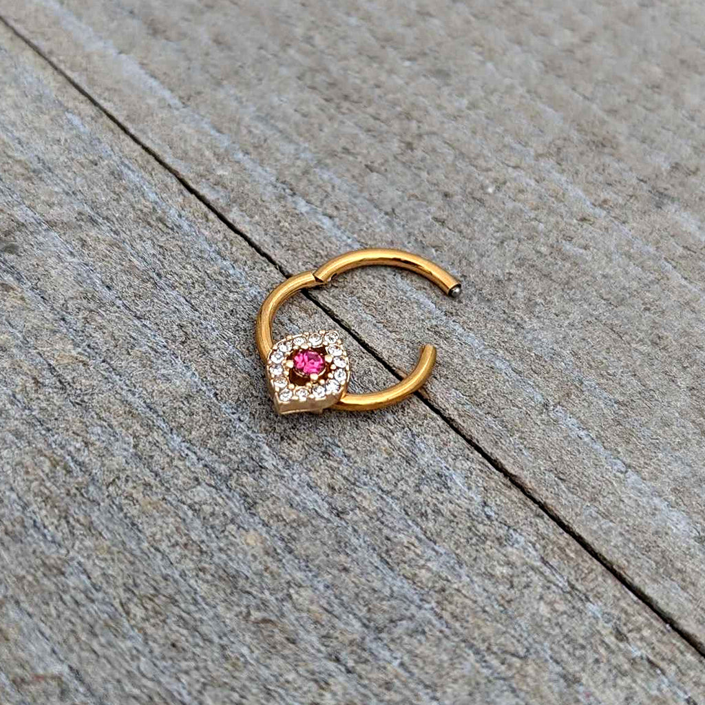 BodyCandy 16G 3/8 Clear Pink Gem Gold Tone Open Eye Hinged Segment Ring — in-use photo