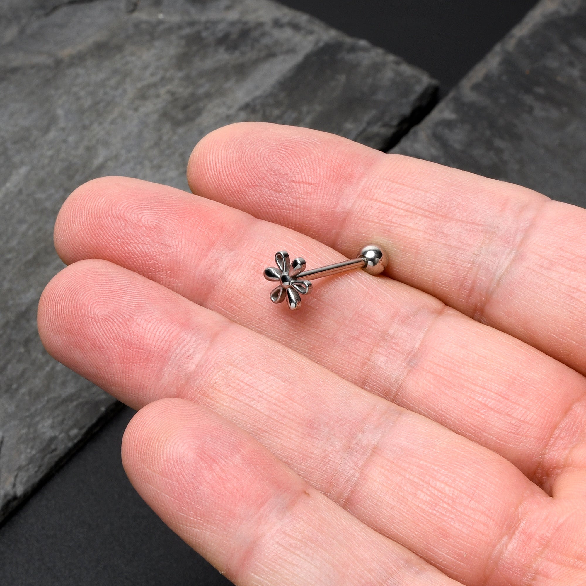 BodyCandy 316L Surgical Steel Loopy Hippie Flower End Barbell Tongue Ring — in-use photo