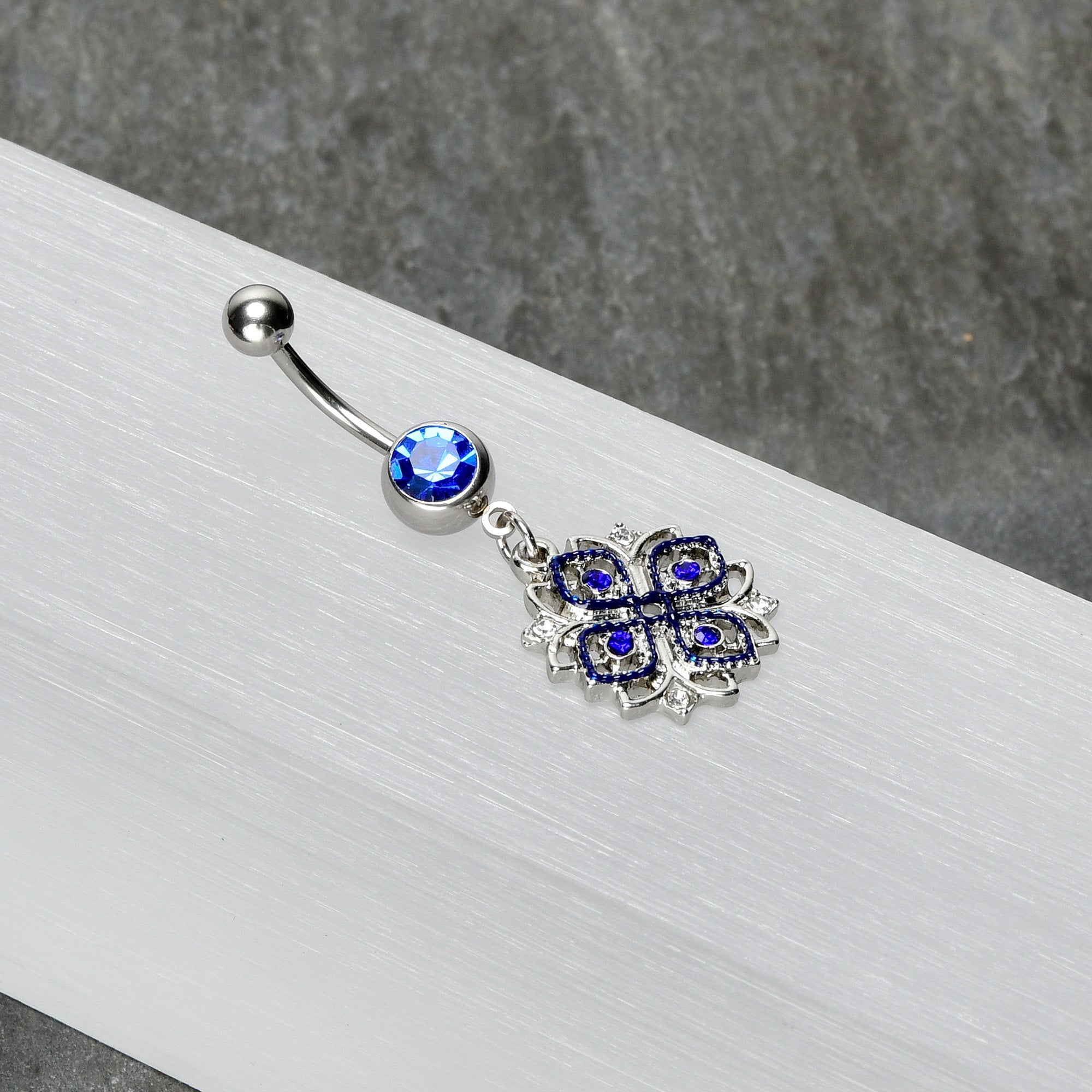 BodyCandy Clear Blue Gem Embellished Cross Dangle Belly Ring — alternative angle