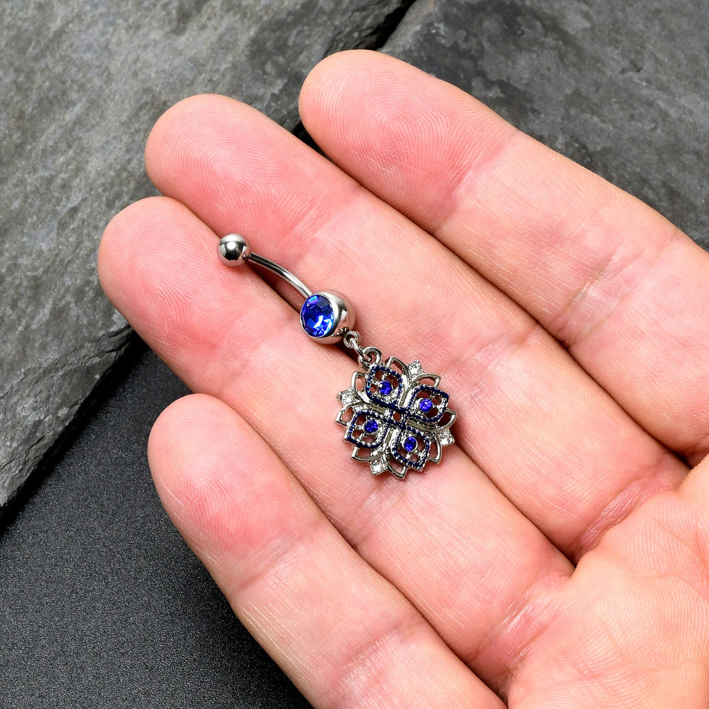 BodyCandy Clear Blue Gem Embellished Cross Dangle Belly Ring — in-use photo