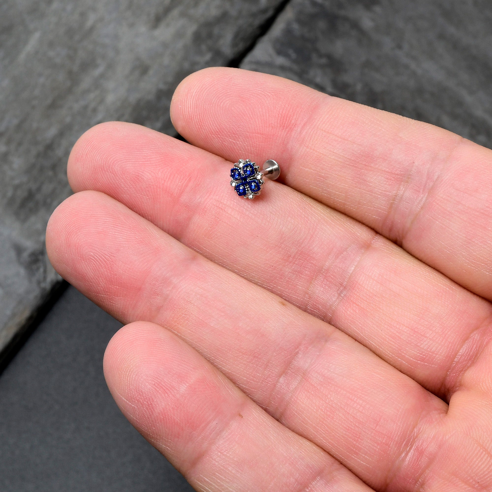 BodyCandy 16G 1/4 Clear Blue Gem Embellished Cross Labret — in-use photo
