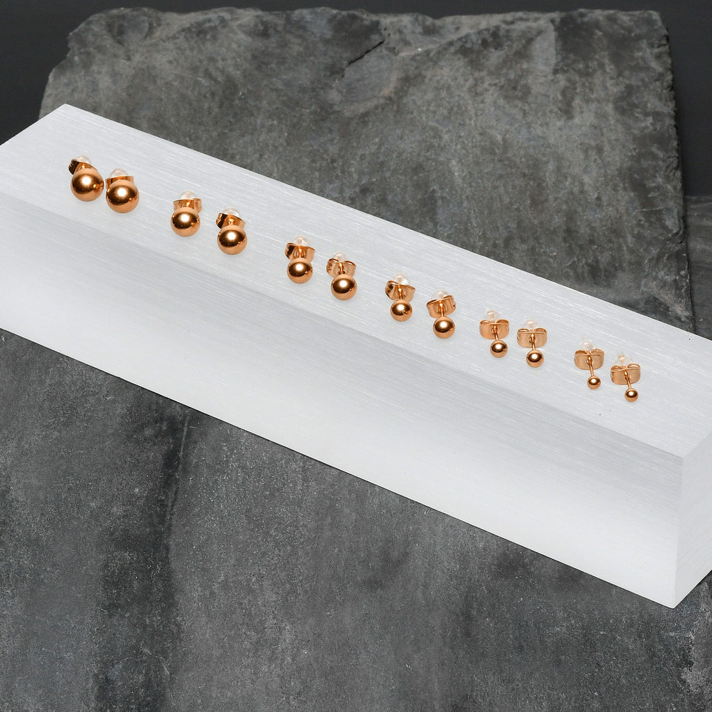 BodyCandy 3mm-8mm Ball Stud Rose Gold Tone 316L Stainless Steel Earrings 6 Pack — lifestyle context