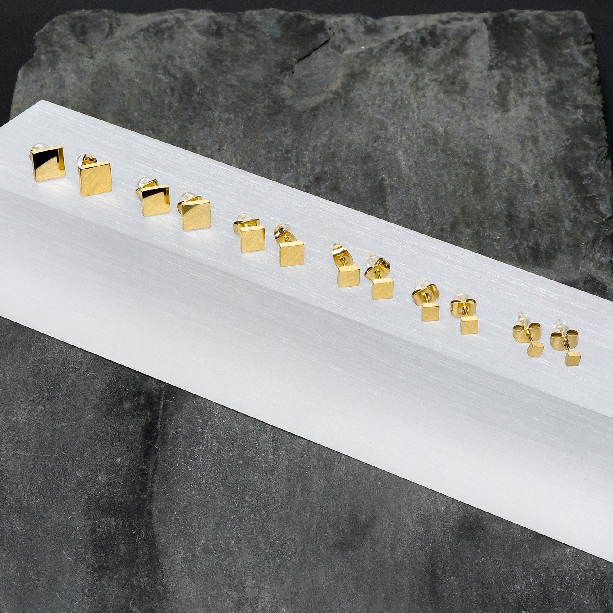 BodyCandy 3mm-8mm Square Stud Gold Tone 316L Stainless Steel Earrings 6 Pack — lifestyle context