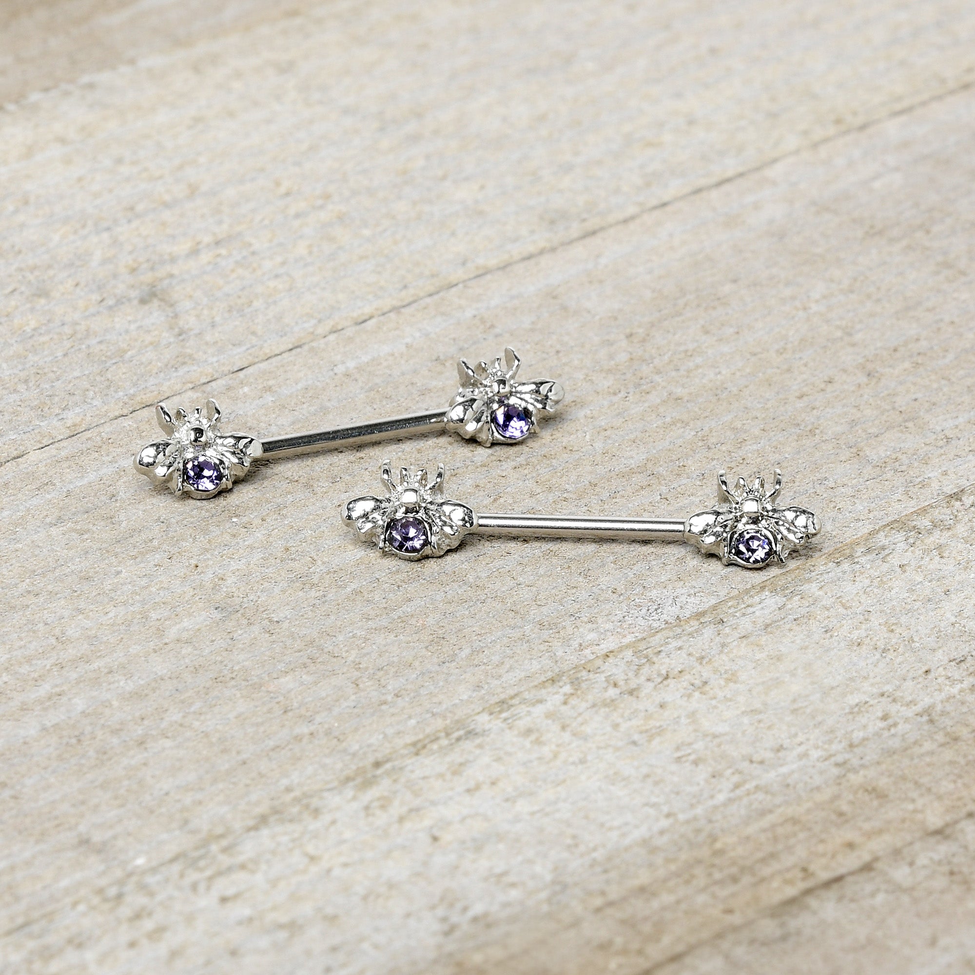 BodyCandy 14G 9/16 Purple Gem Bee Beautiful Insect Barbell Nipple Ring Set — side view