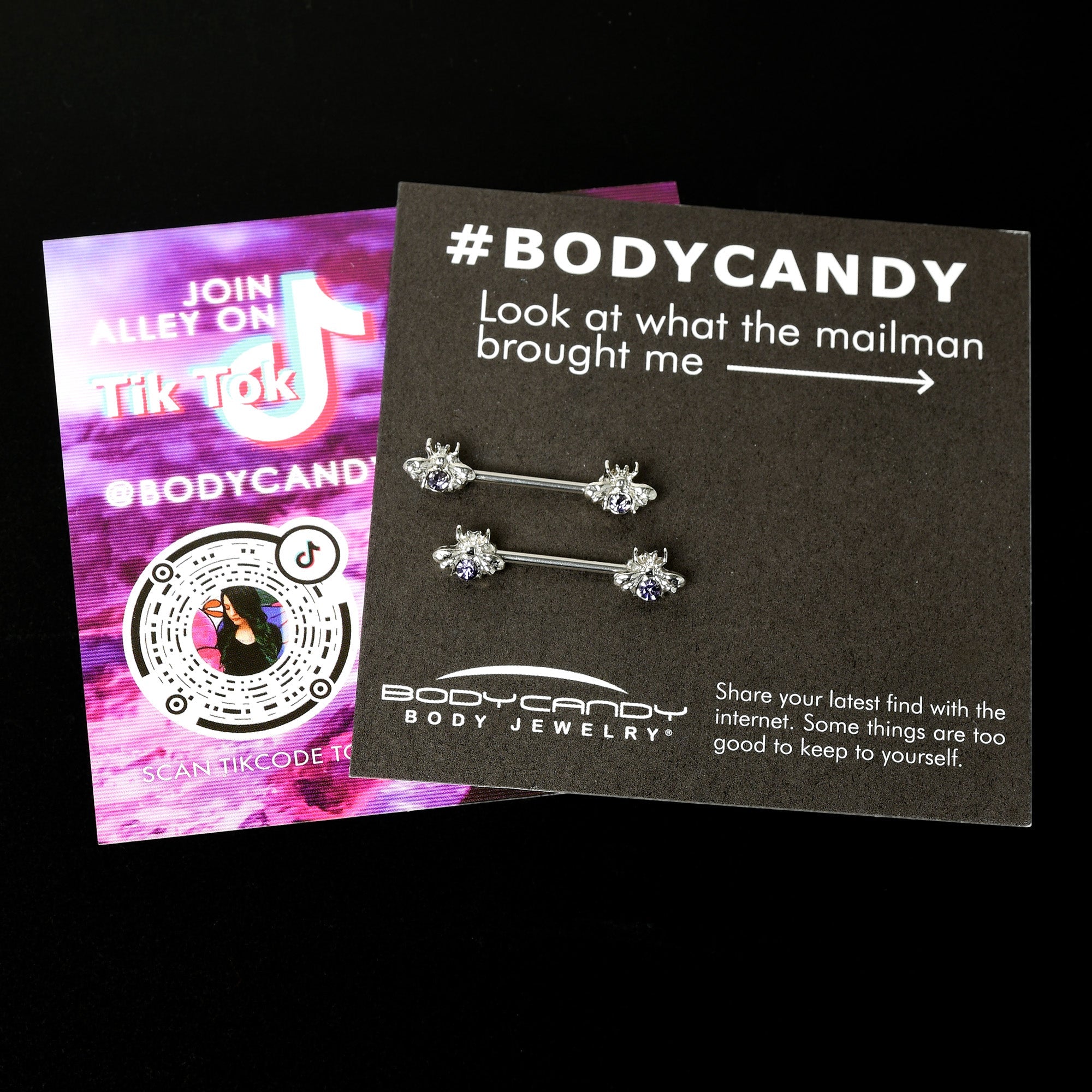 BodyCandy 14G 9/16 Purple Gem Bee Beautiful Insect Barbell Nipple Ring Set — in-use photo